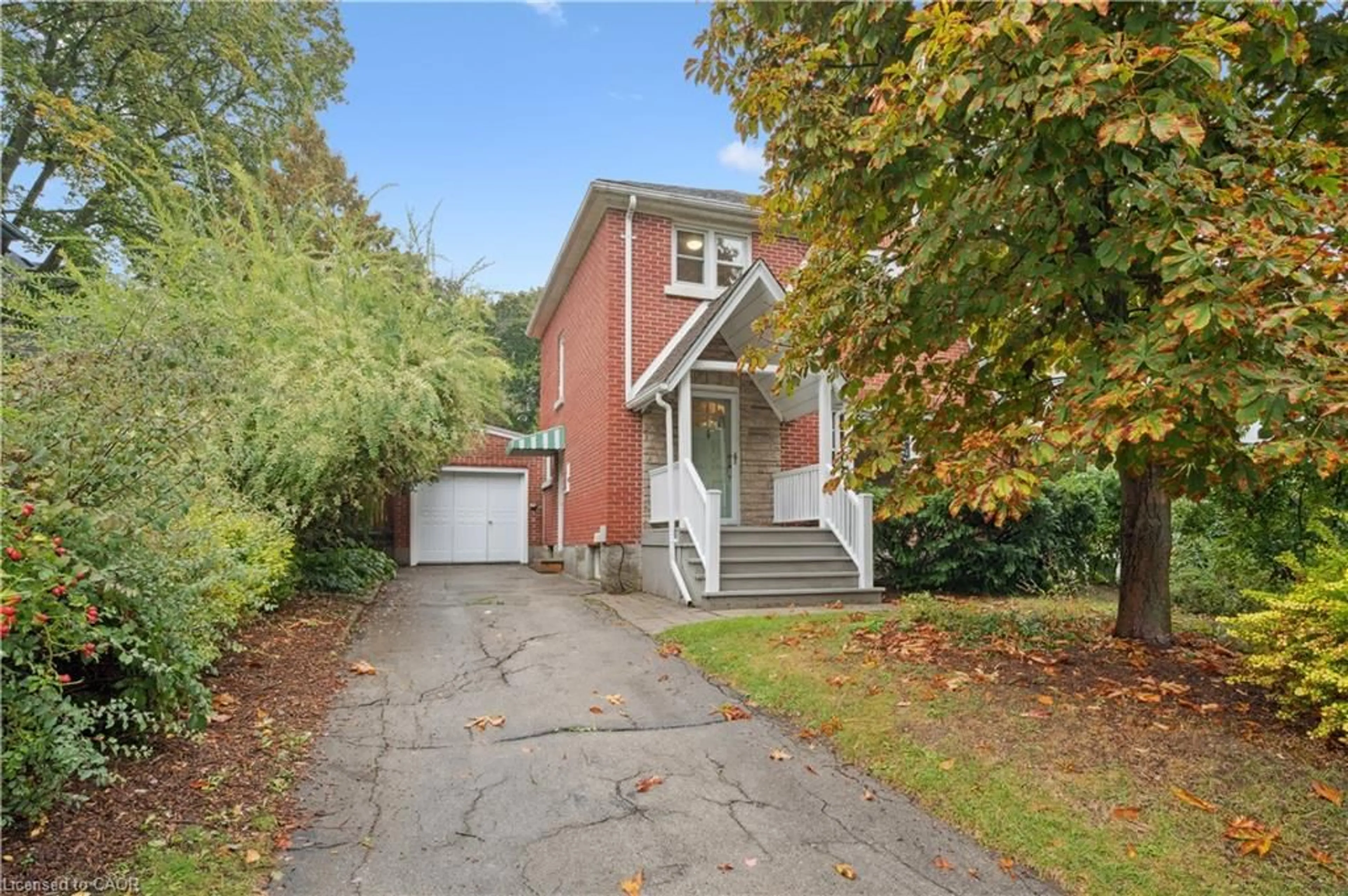 Home with brick exterior material, street for 103 Dunbar Rd, Waterloo Ontario N2L 2E4