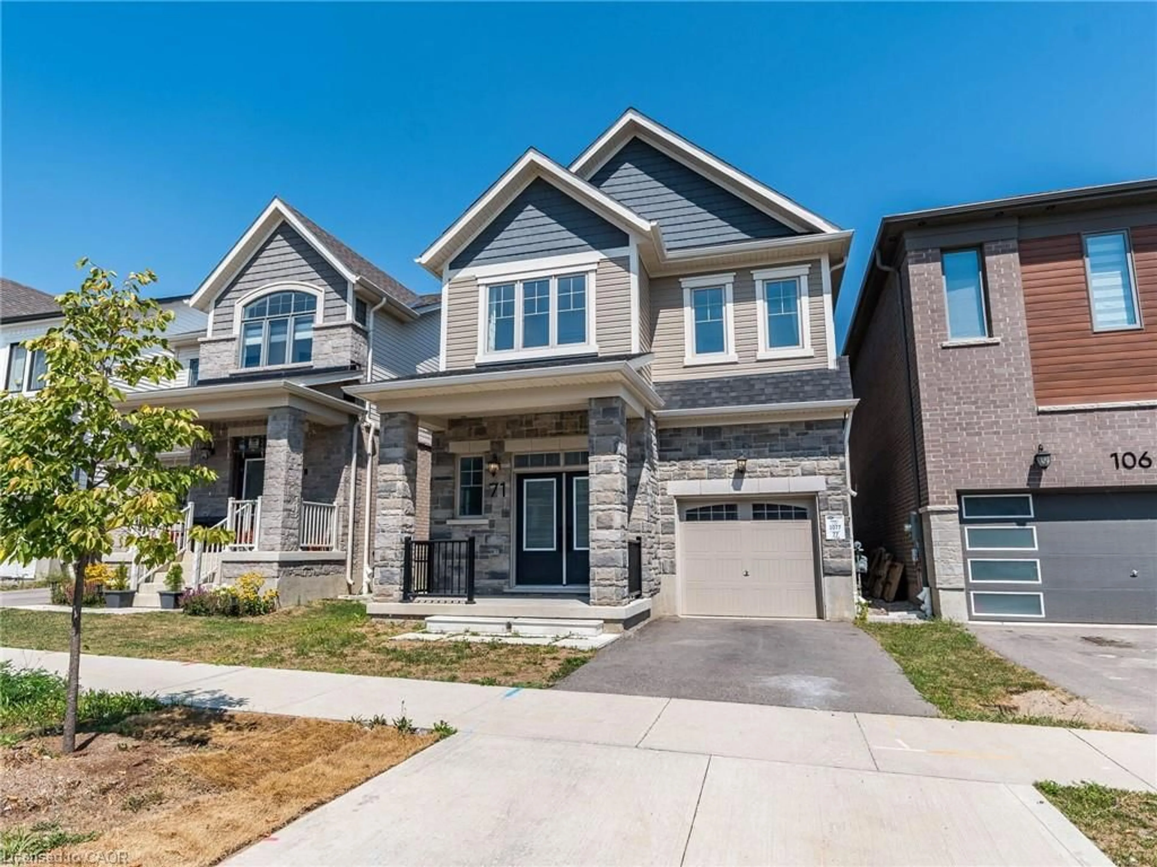 Home with brick exterior material, street for 71 Routley St, Kitchener Ontario N2E 3X8