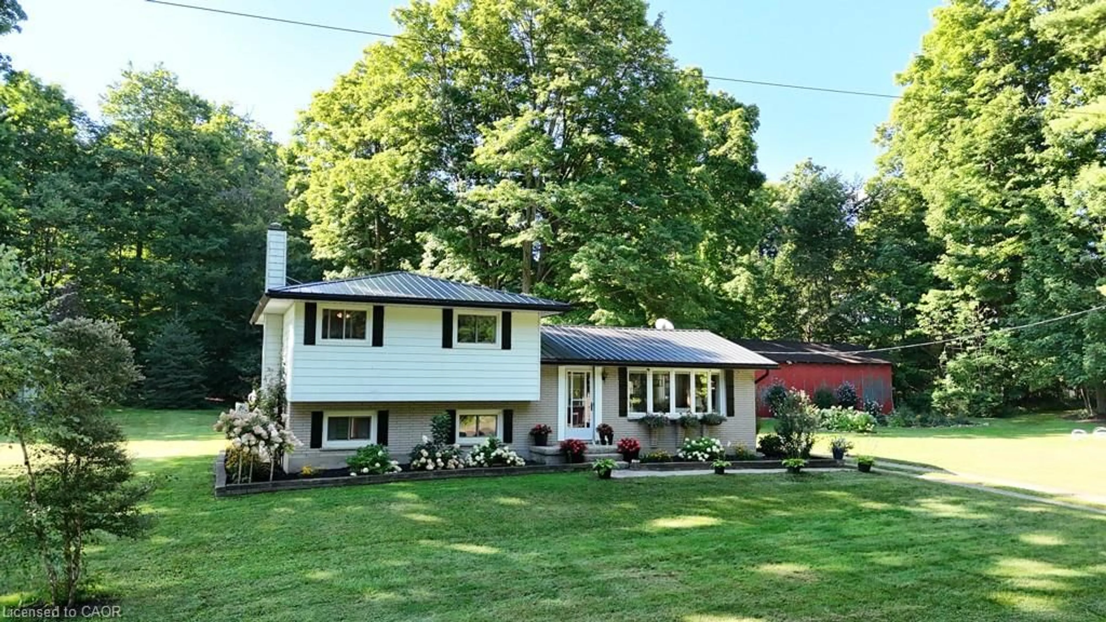 Home with vinyl exterior material, street for 887372 Township Road 11 Rd, Bright Ontario N0J 1B0