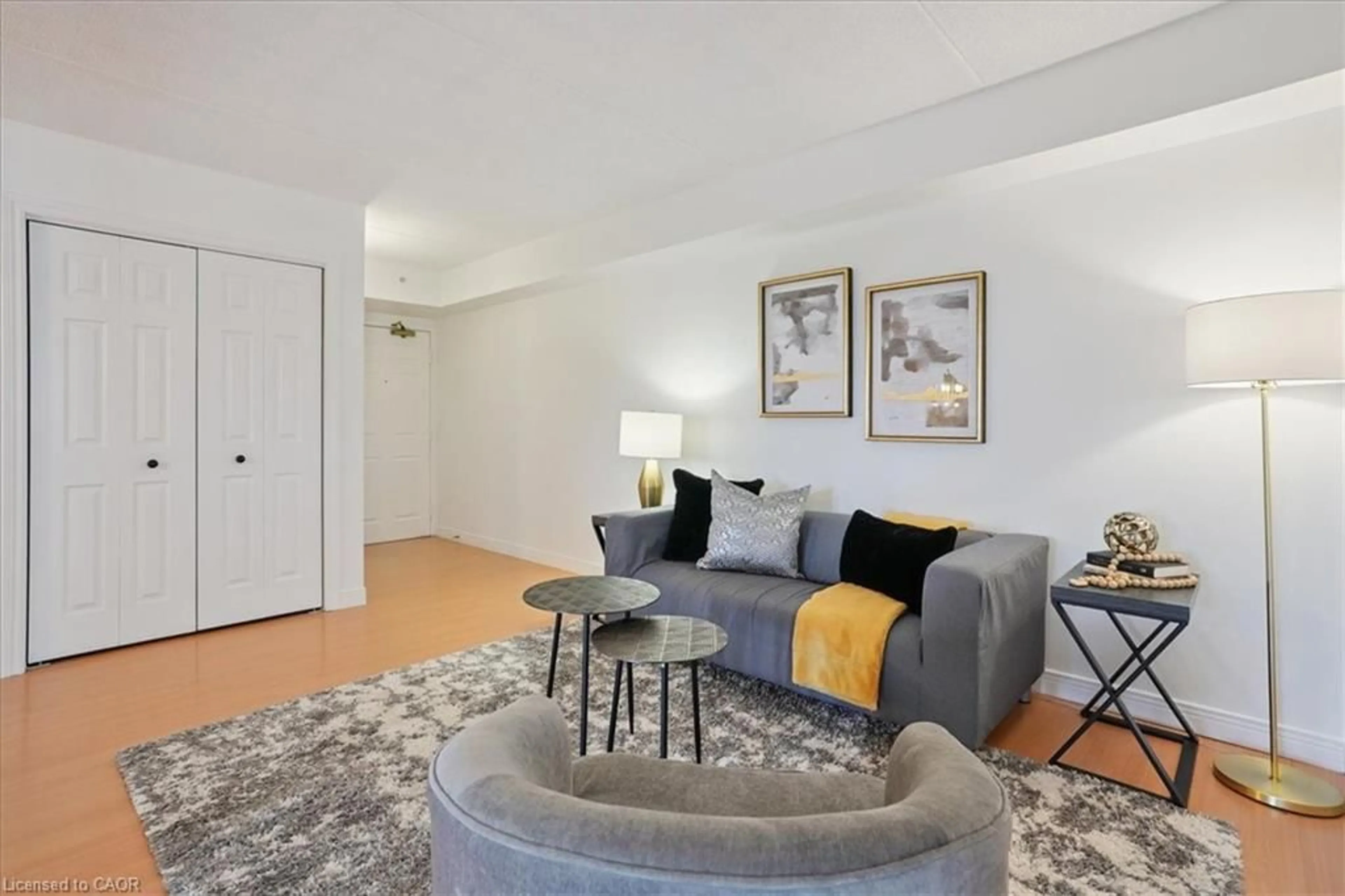 Living room with furniture, carpet floor for 1411 Walker's Line #301, Burlington Ontario L7M 4P5