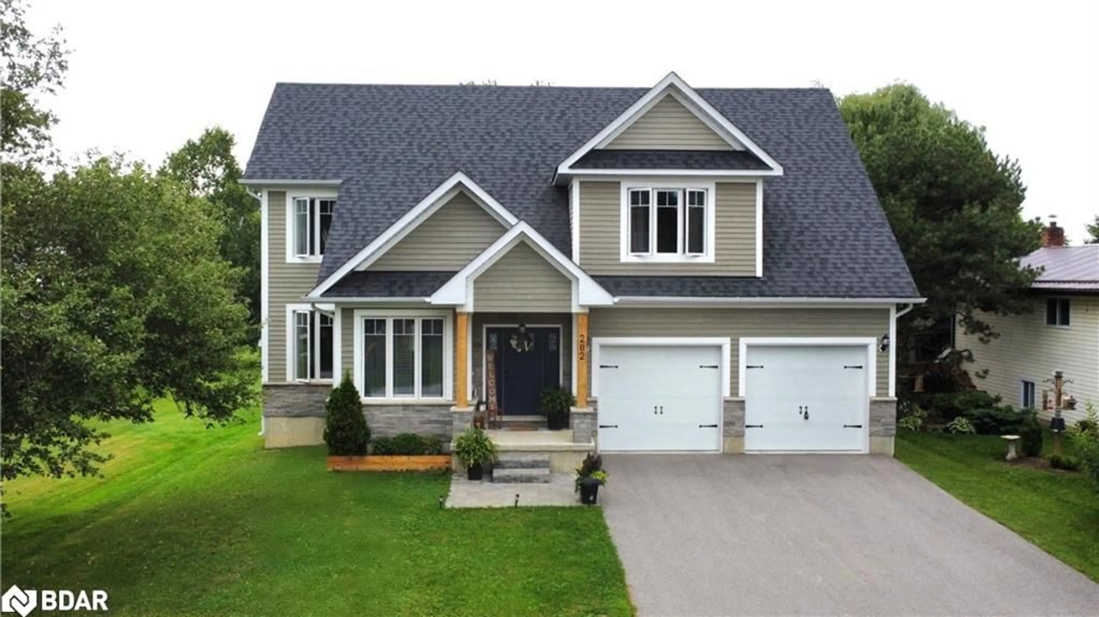 Home with vinyl exterior material, street for 202 Clarence St, Stayner Ontario L0M 1S0