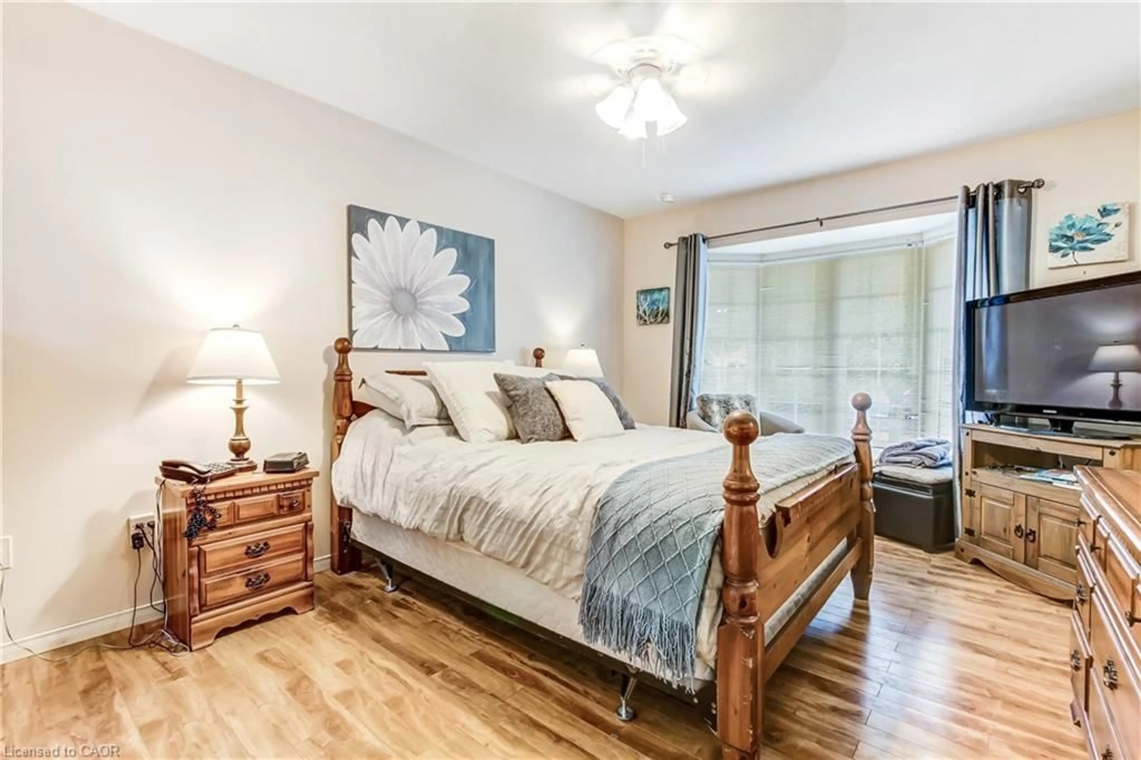 Bedroom with bed, wood/laminate floor for 5 Walsingham Dr, Port Rowan Ontario N0E 1M0