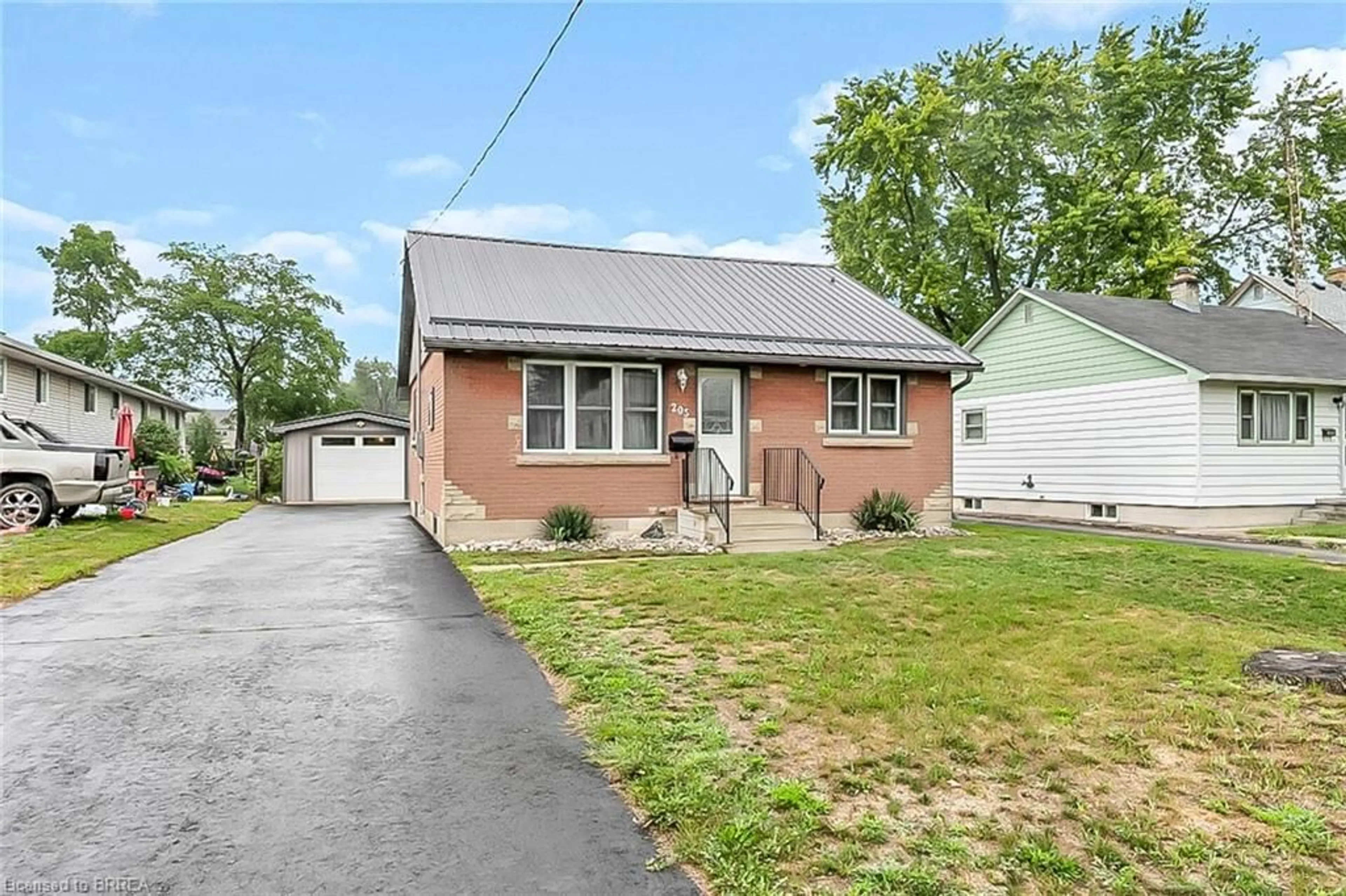 Home with brick exterior material, street for 205 Crysler St, Delhi Ontario N4B 1H9