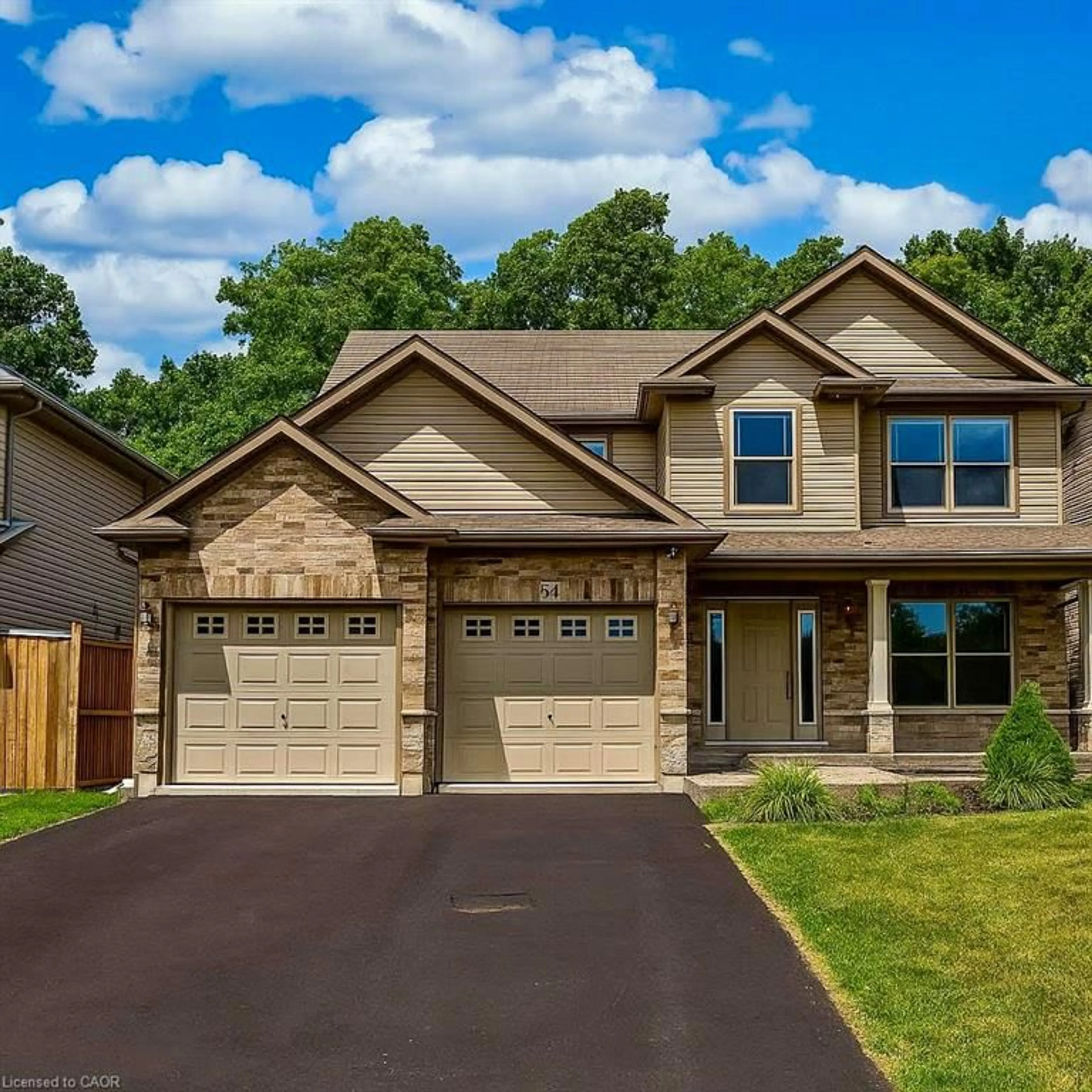 Home with brick exterior material, street for 54 Harvest Gate, Smithville Ontario L0R 2A0