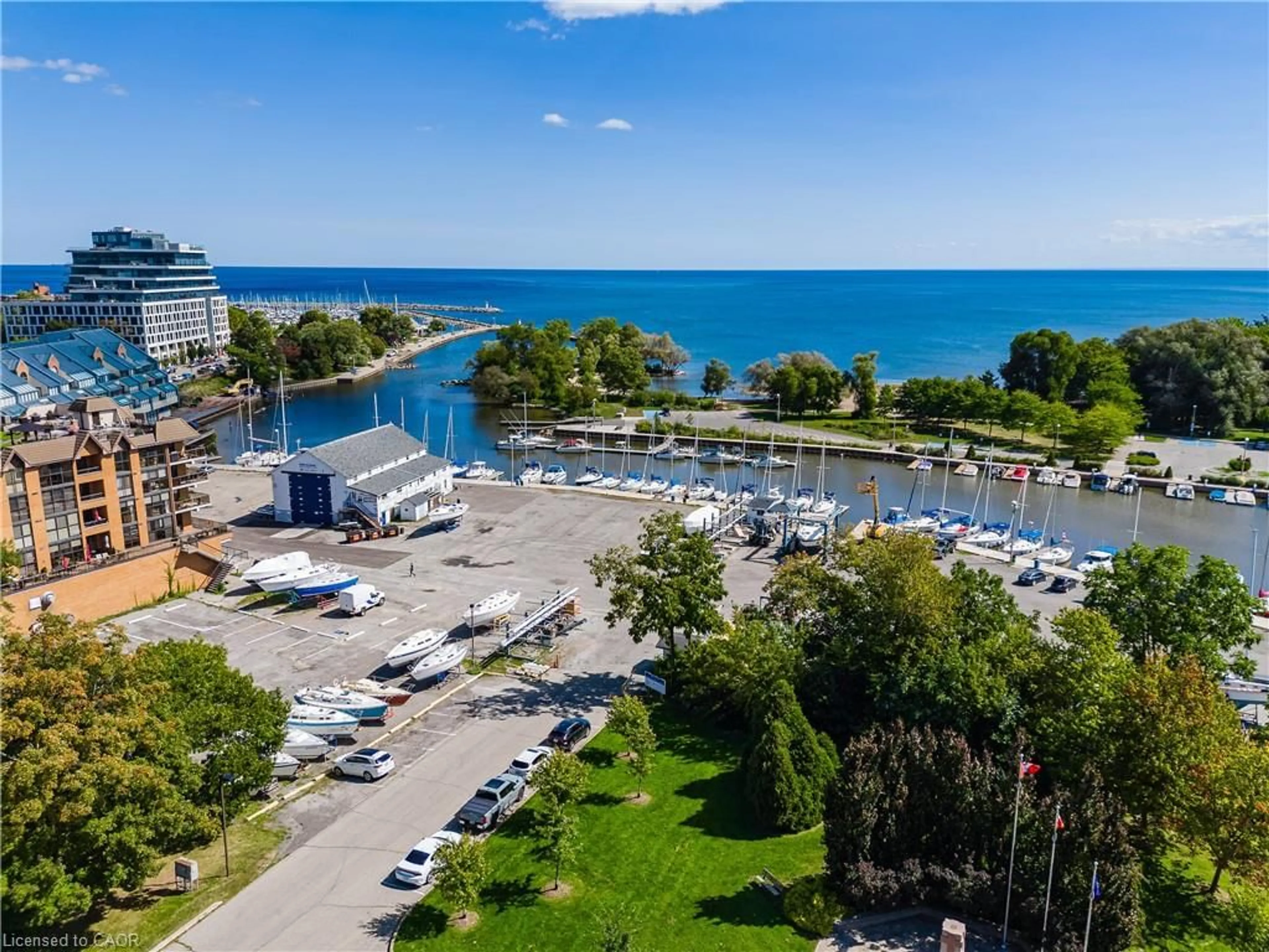 A pic from outside/outdoor area/front of a property/back of a property/a pic from drone, water/lake/river/ocean view for 2511 Lakeshore Rd #805, Oakville Ontario L6L 6L9