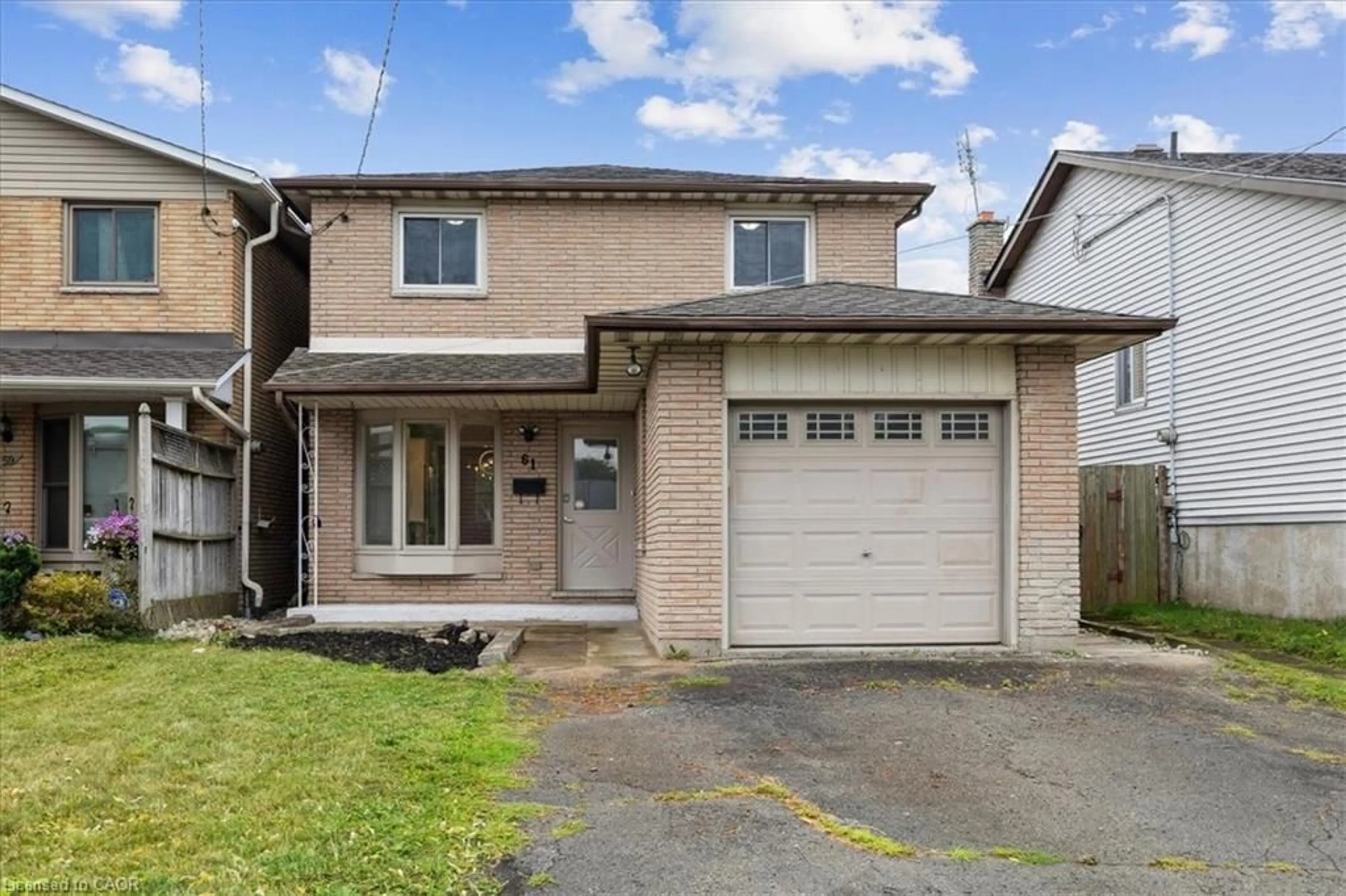 Home with brick exterior material, street for 61 Adis Ave, Hamilton Ontario L9C 6T9