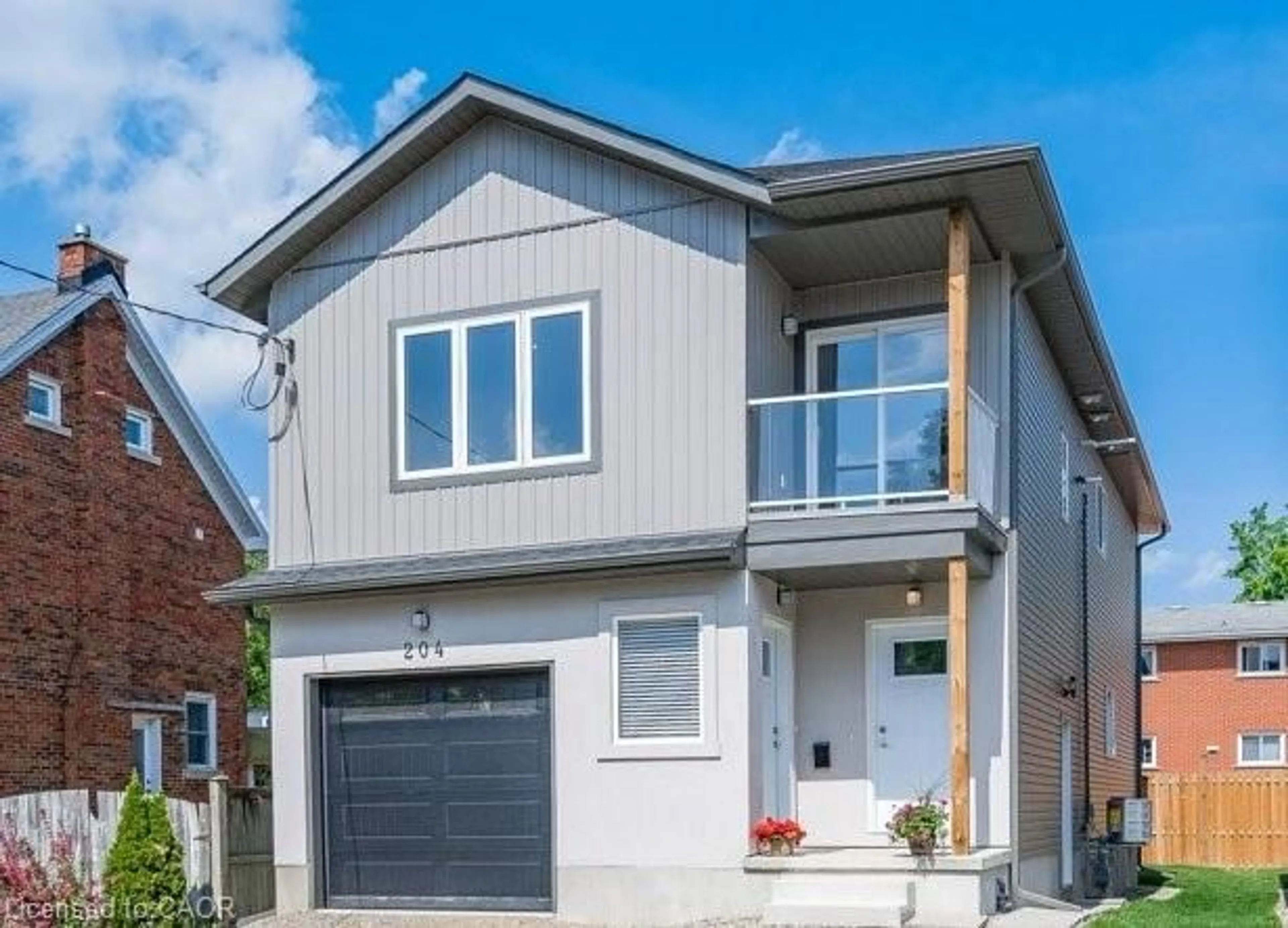 Home with brick exterior material, street for 204 Fifth Ave, Kitchener Ontario N2C 1P7