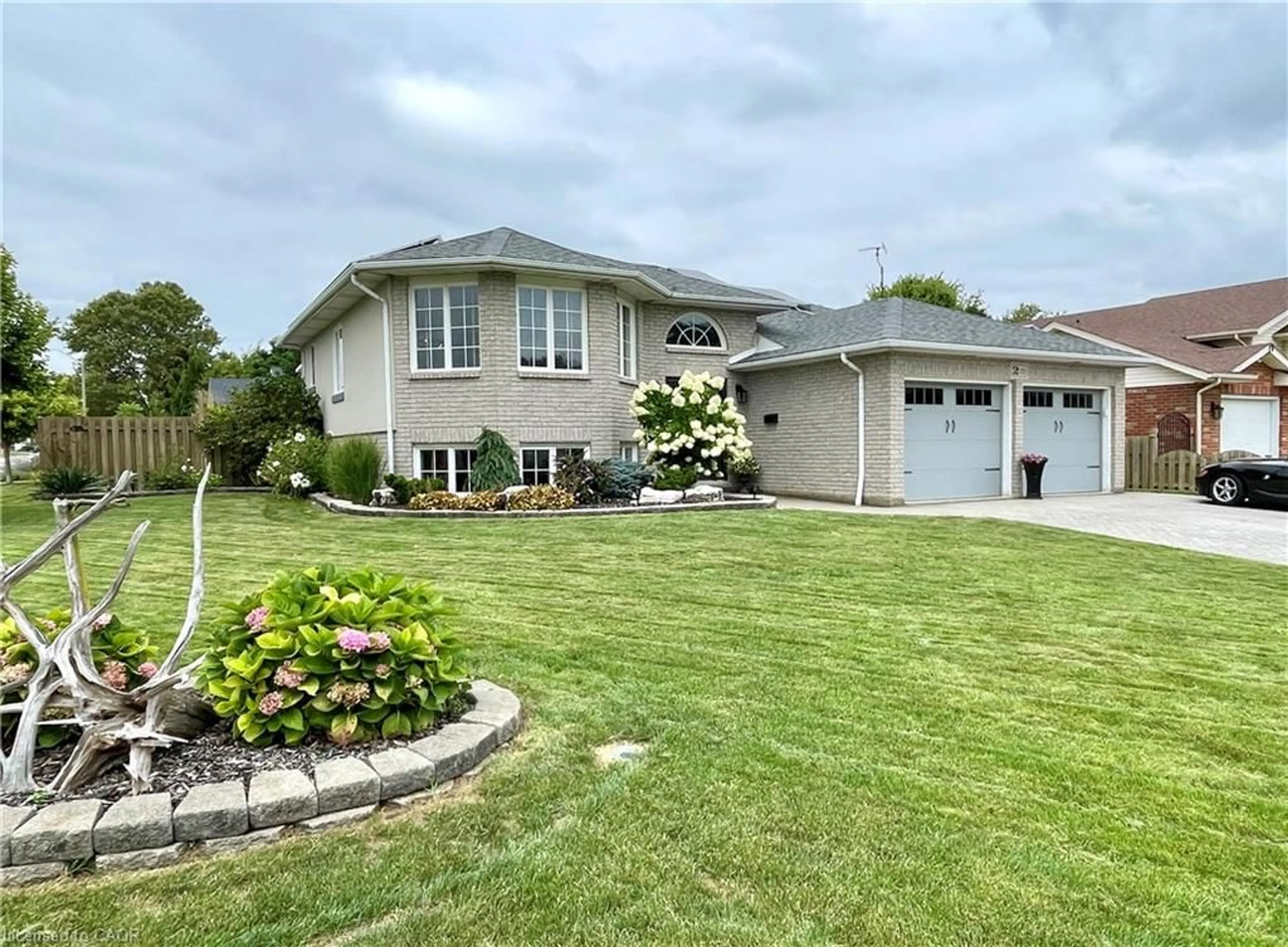 A pic from outside/outdoor area/front of a property/back of a property/a pic from drone, water/lake/river/ocean view for 2 Angel Crt, Kingsville Ontario N9Y 3Z4