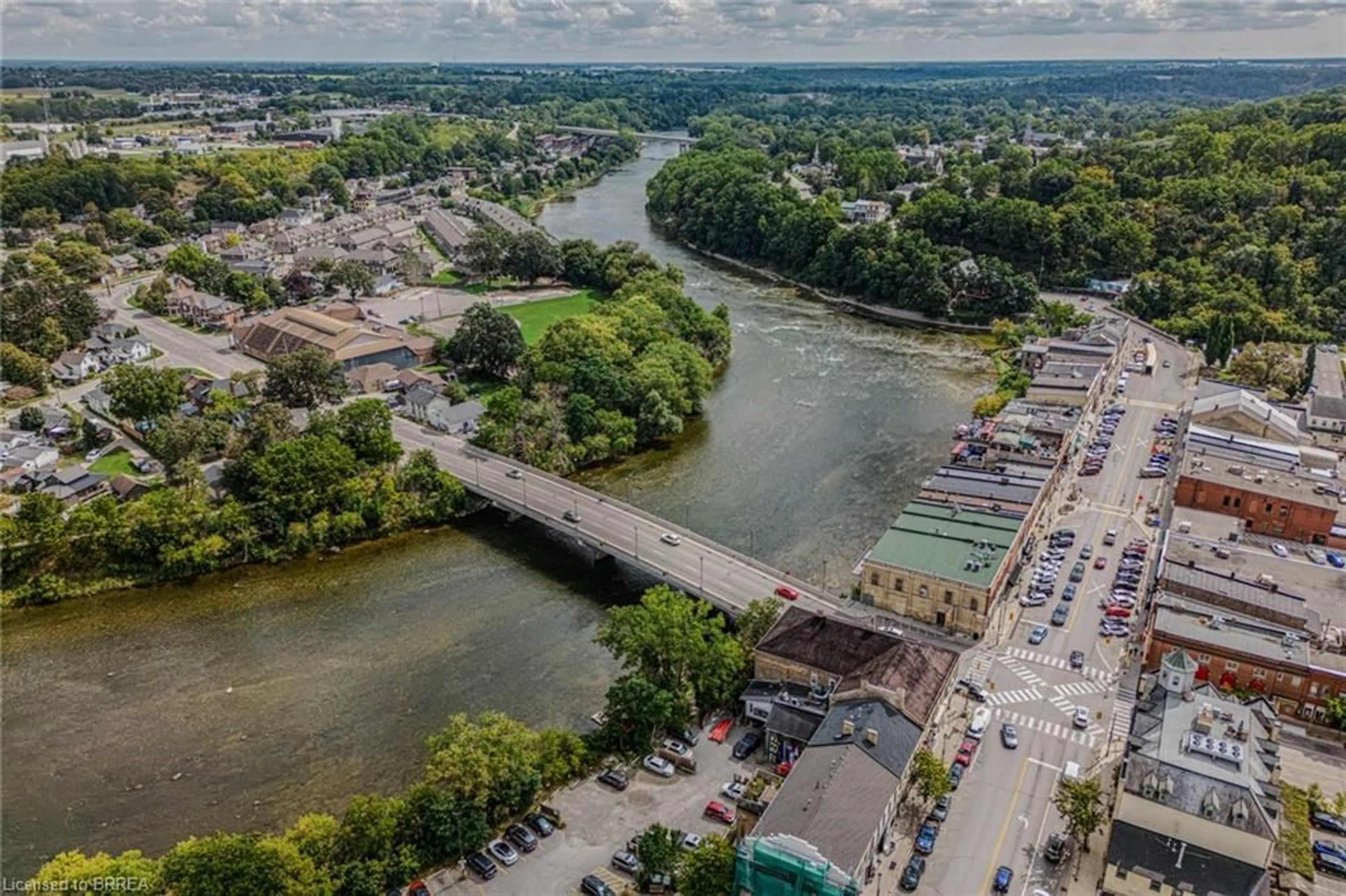 A pic from outside/outdoor area/front of a property/back of a property/a pic from drone, water/lake/river/ocean view for 80 West River St, Paris Ontario N3L 2V1