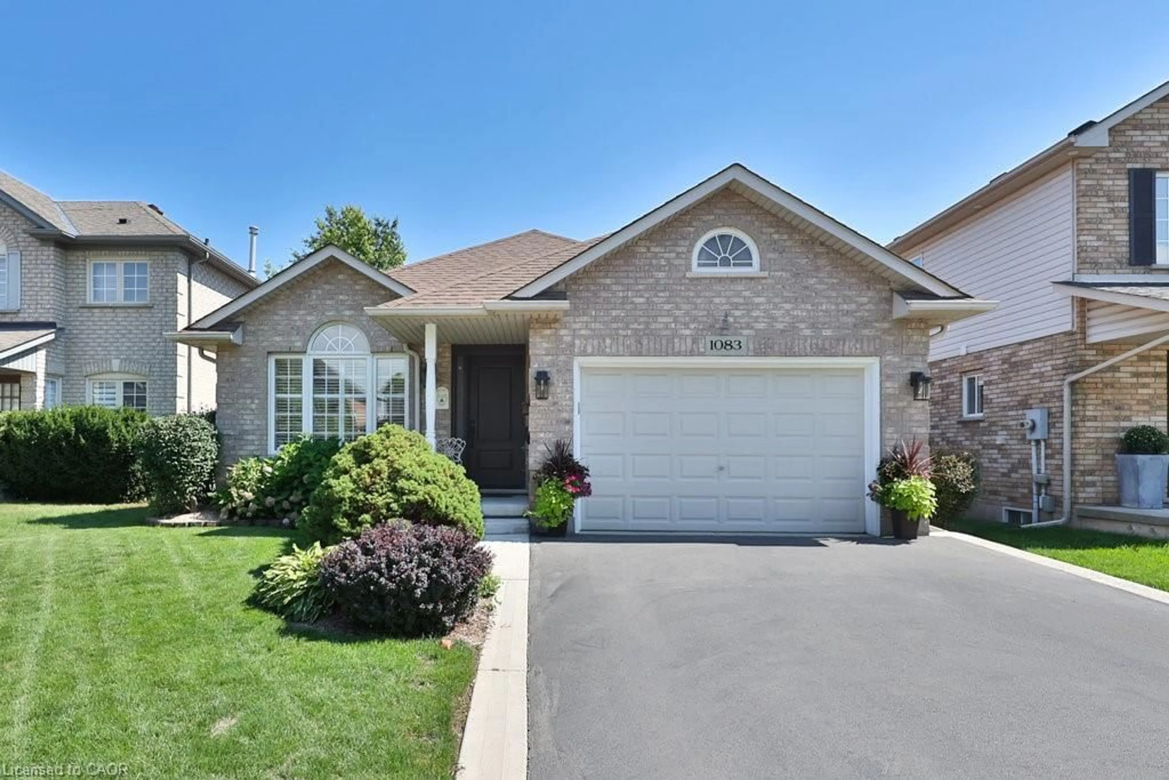 Home with brick exterior material, street for 1083 Augustus Dr, Burlington Ontario L7S 2L2