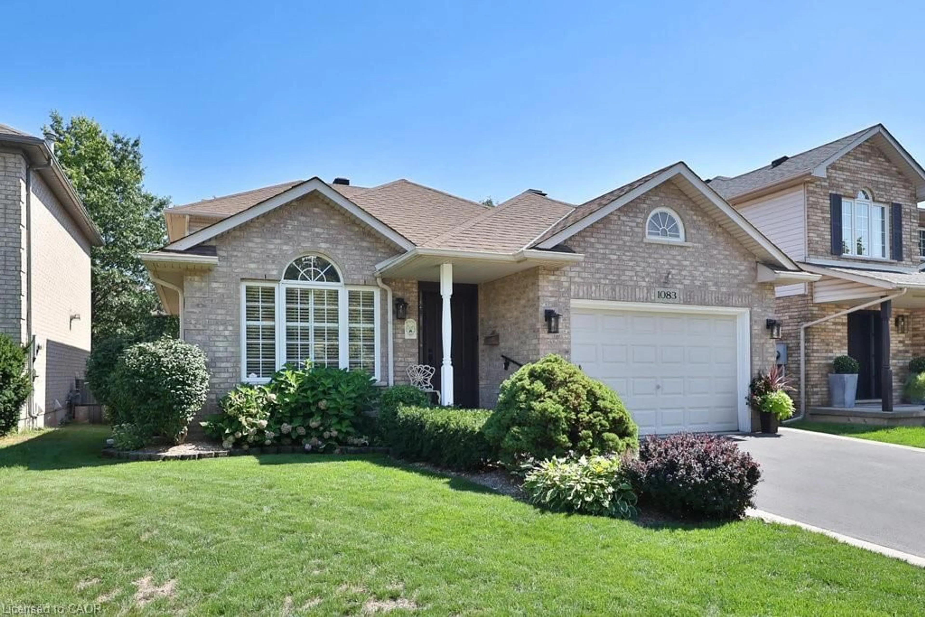 Home with brick exterior material, street for 1083 Augustus Dr, Burlington Ontario L7S 2L2