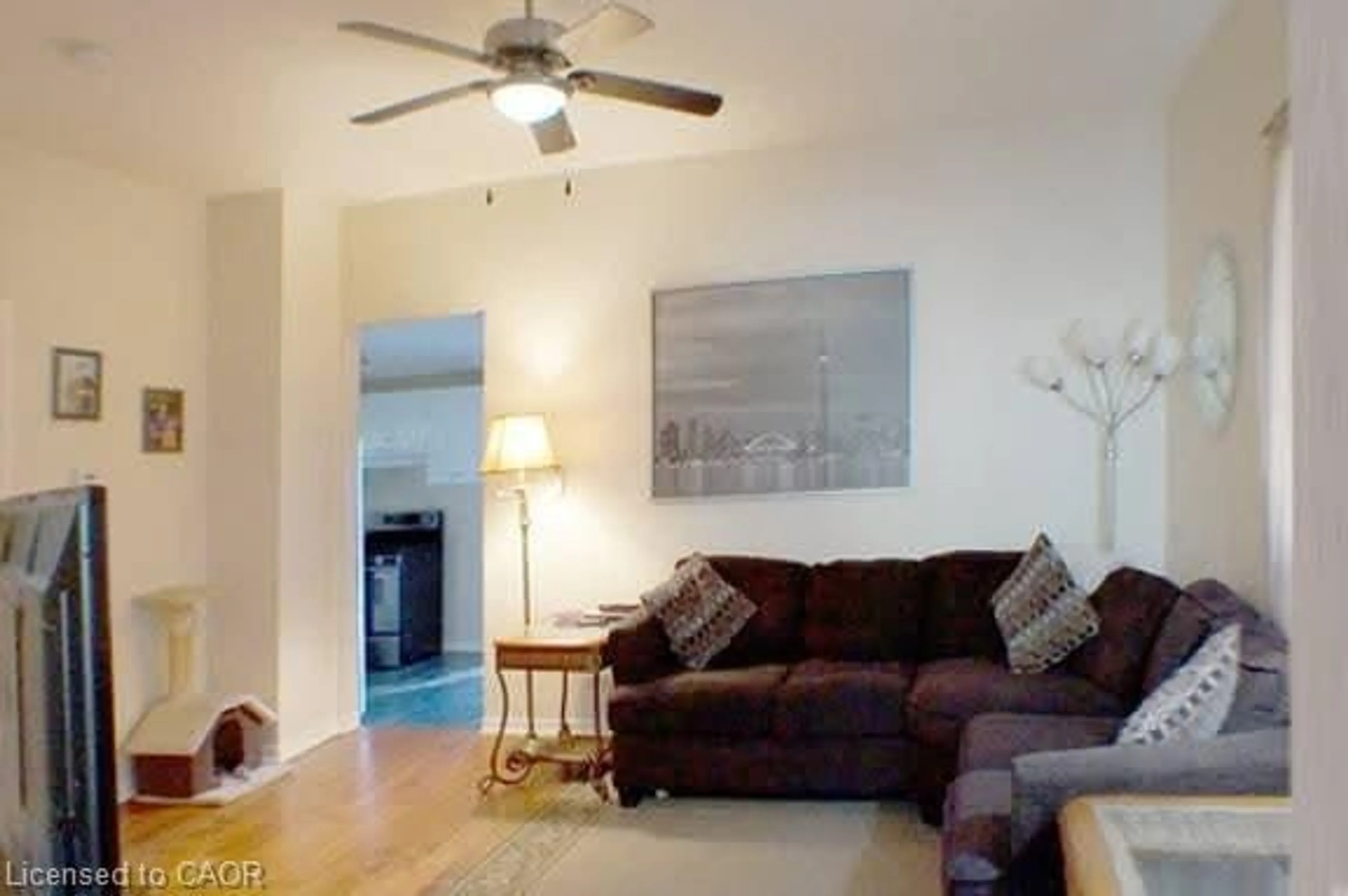 Living room with furniture, wood/laminate floor for 900 Concession St, Hamilton Ontario L8V 1E8