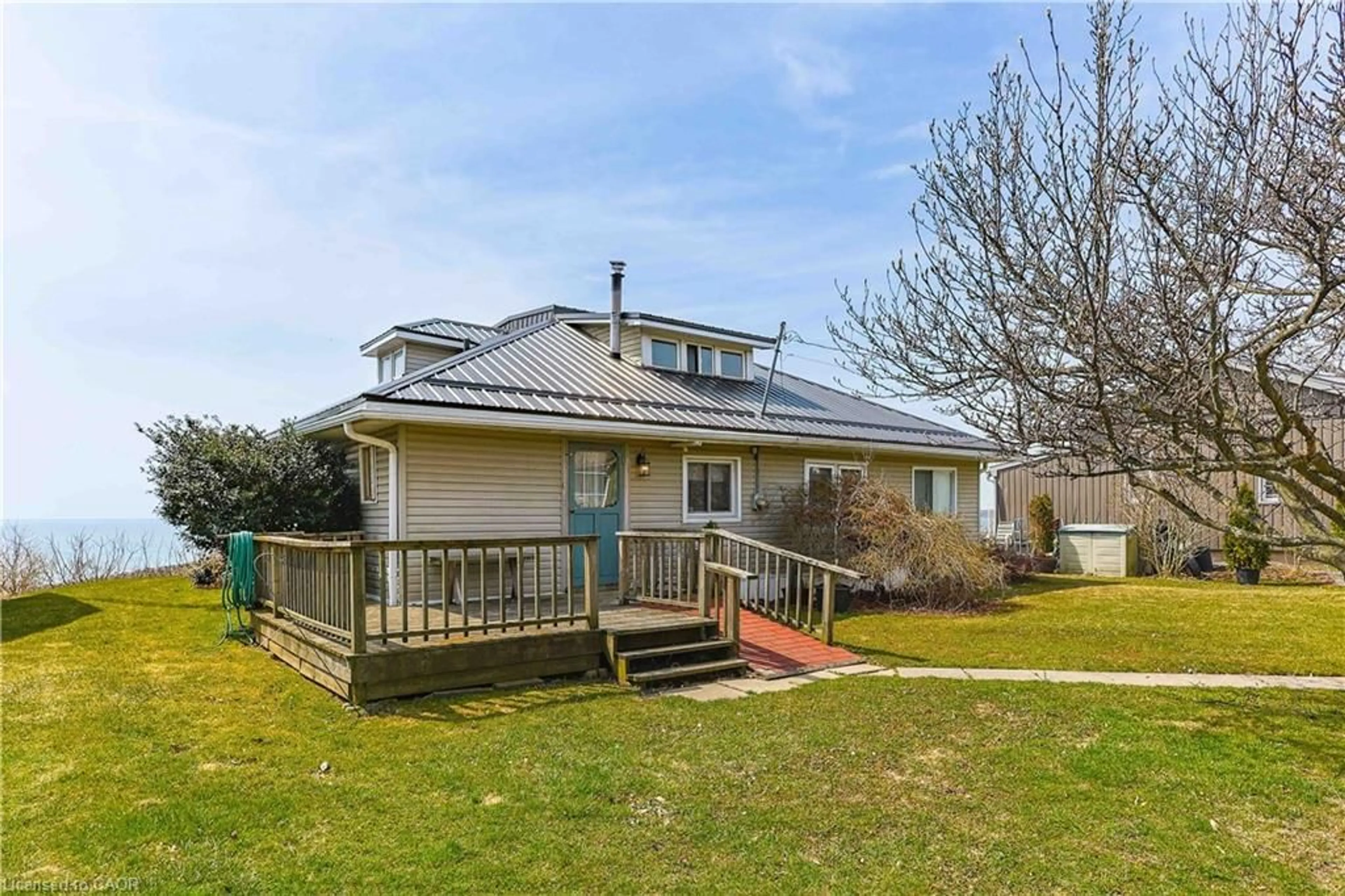 A pic from outside/outdoor area/front of a property/back of a property/a pic from drone, unknown for 78 Brown St, Port Dover Ontario N0A 1N7