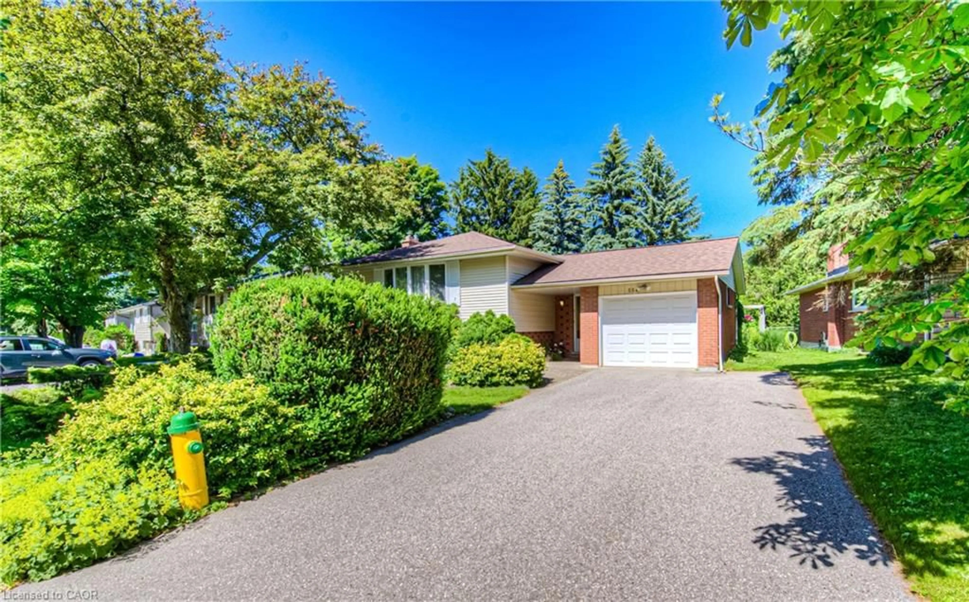 Home with brick exterior material, street for 554 Sprucehill Ave, Waterloo Ontario N2L 4V7