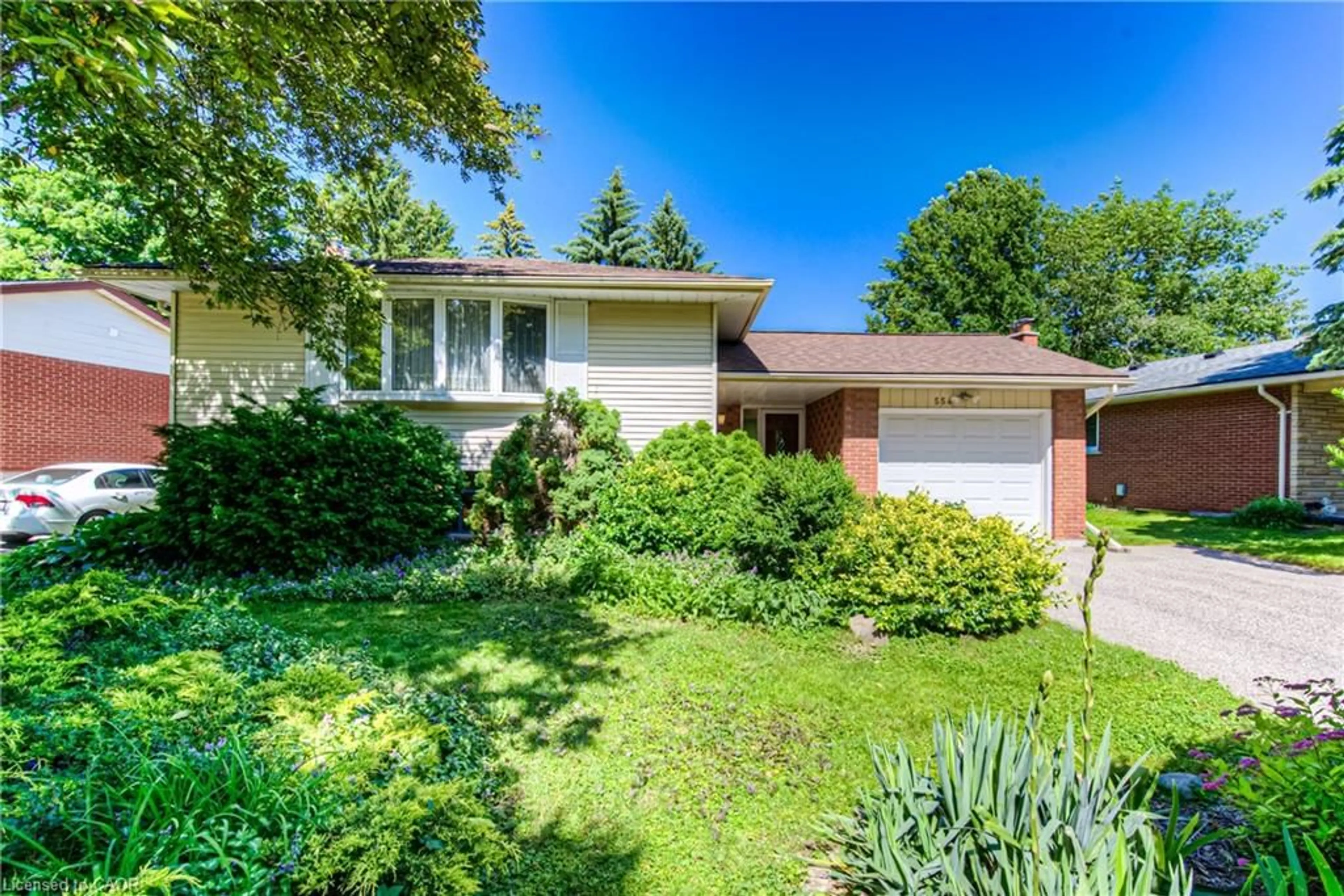 Home with brick exterior material, street for 554 Sprucehill Ave, Waterloo Ontario N2L 4V7