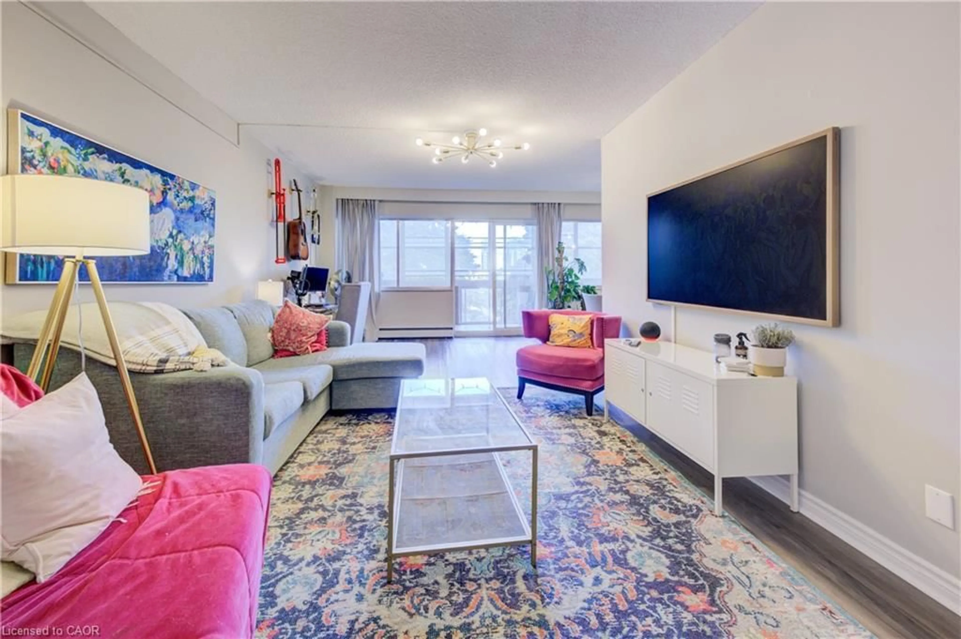 Living room with furniture, unknown for 45 Westmount Rd #302, Waterloo Ontario N2L 2R3