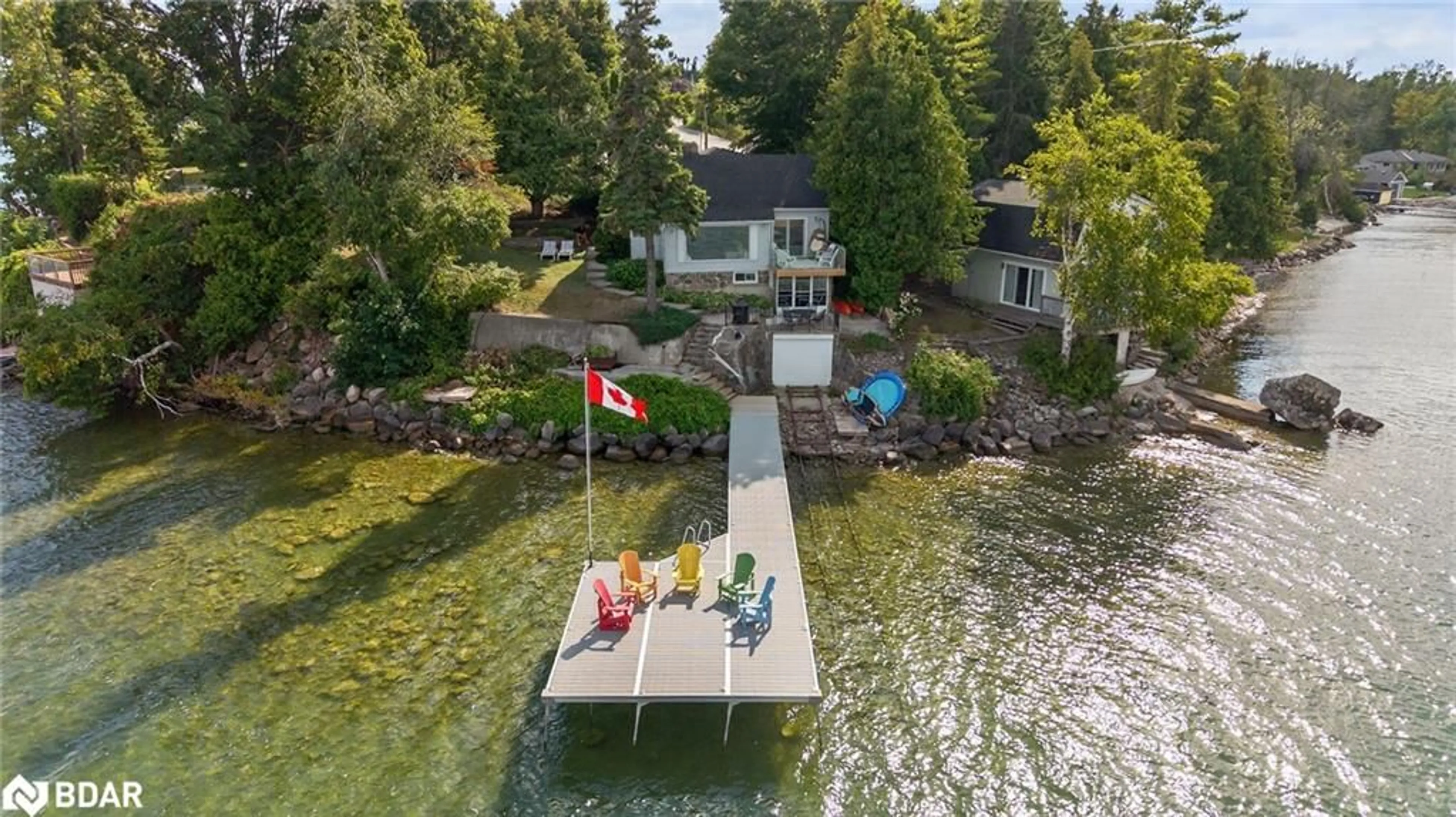 A pic from outside/outdoor area/front of a property/back of a property/a pic from drone, water/lake/river/ocean view for 43 Moon Point Dr, Oro-Medonte Ontario L3V 0R8