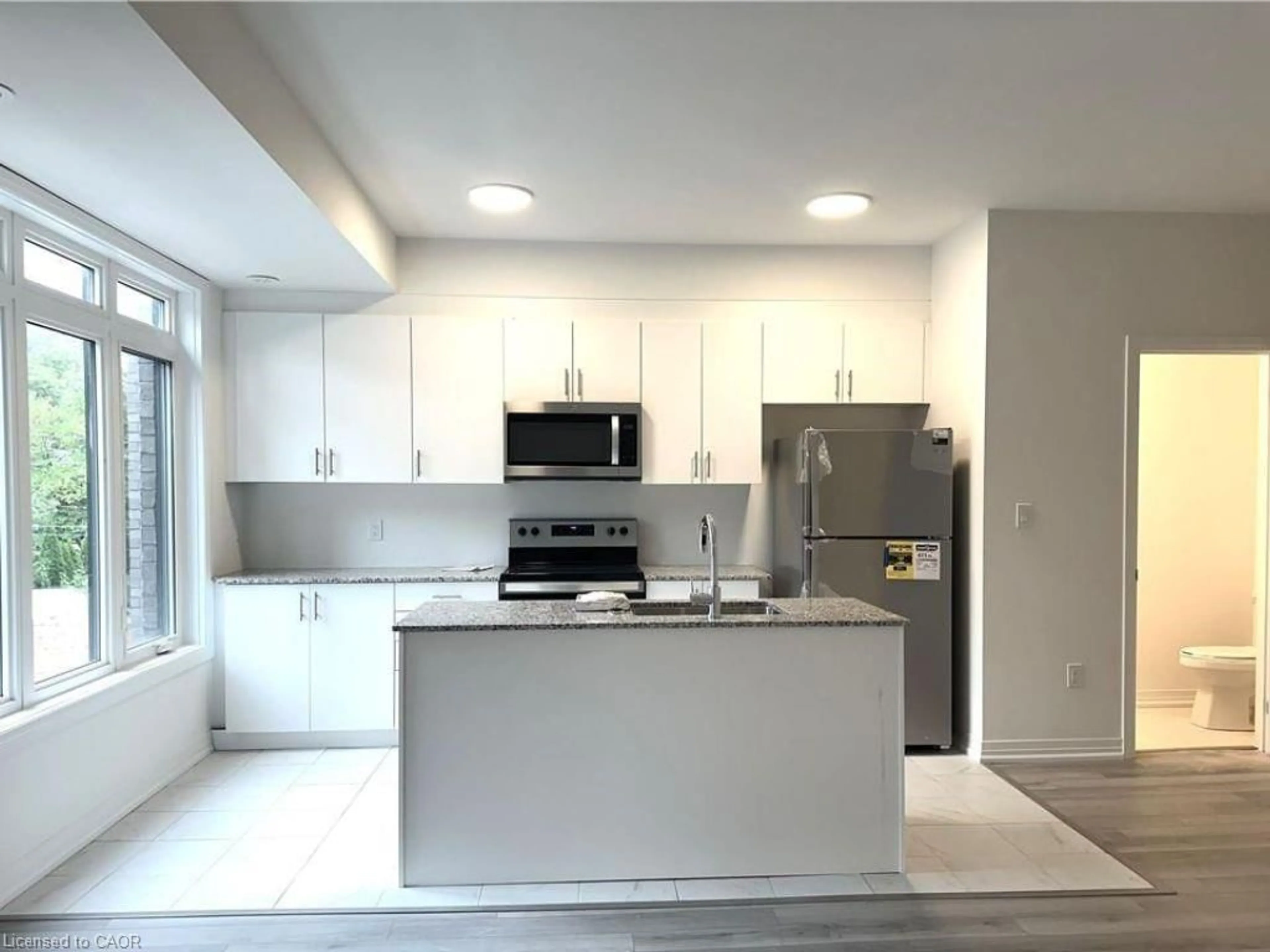 Open concept kitchen, unknown for 34 Sidney Rose Common, St. Catharines Ontario L2T 0B3