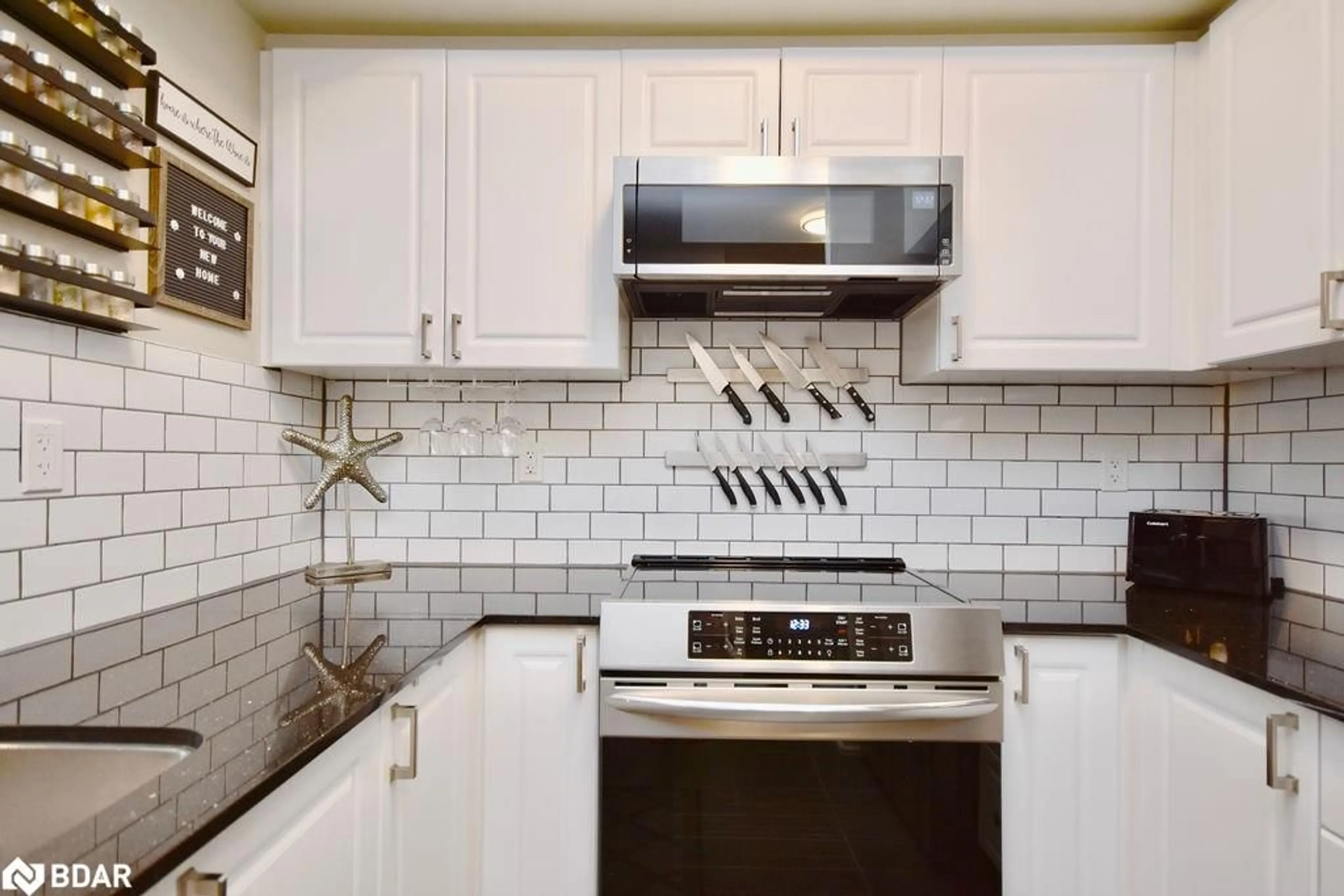Standard kitchen, ceramic/tile floor for 299 Cundles Rd #208, Barrie Ontario L4M 0K9