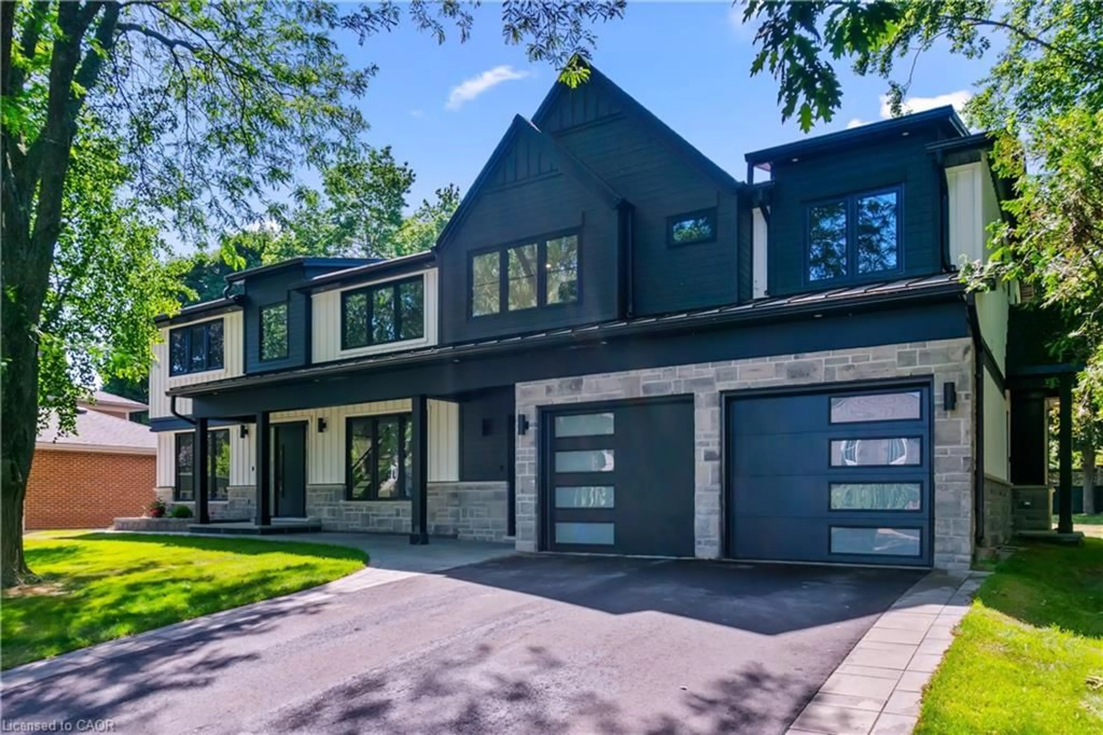 Home with brick exterior material, street for 319 Beechfield Rd, Oakville Ontario L6J 5H9