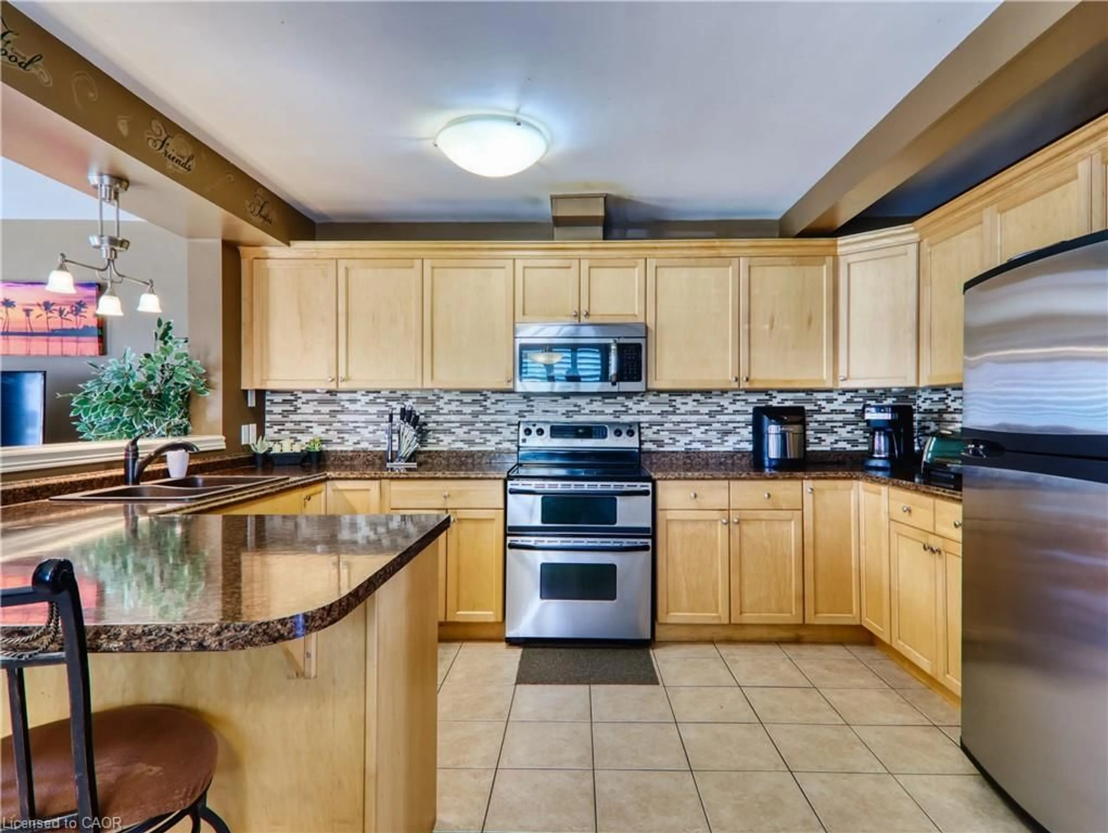 Open concept kitchen, ceramic/tile floor for 7161 Brittany Crt, Niagara Falls Ontario L2H 3N5
