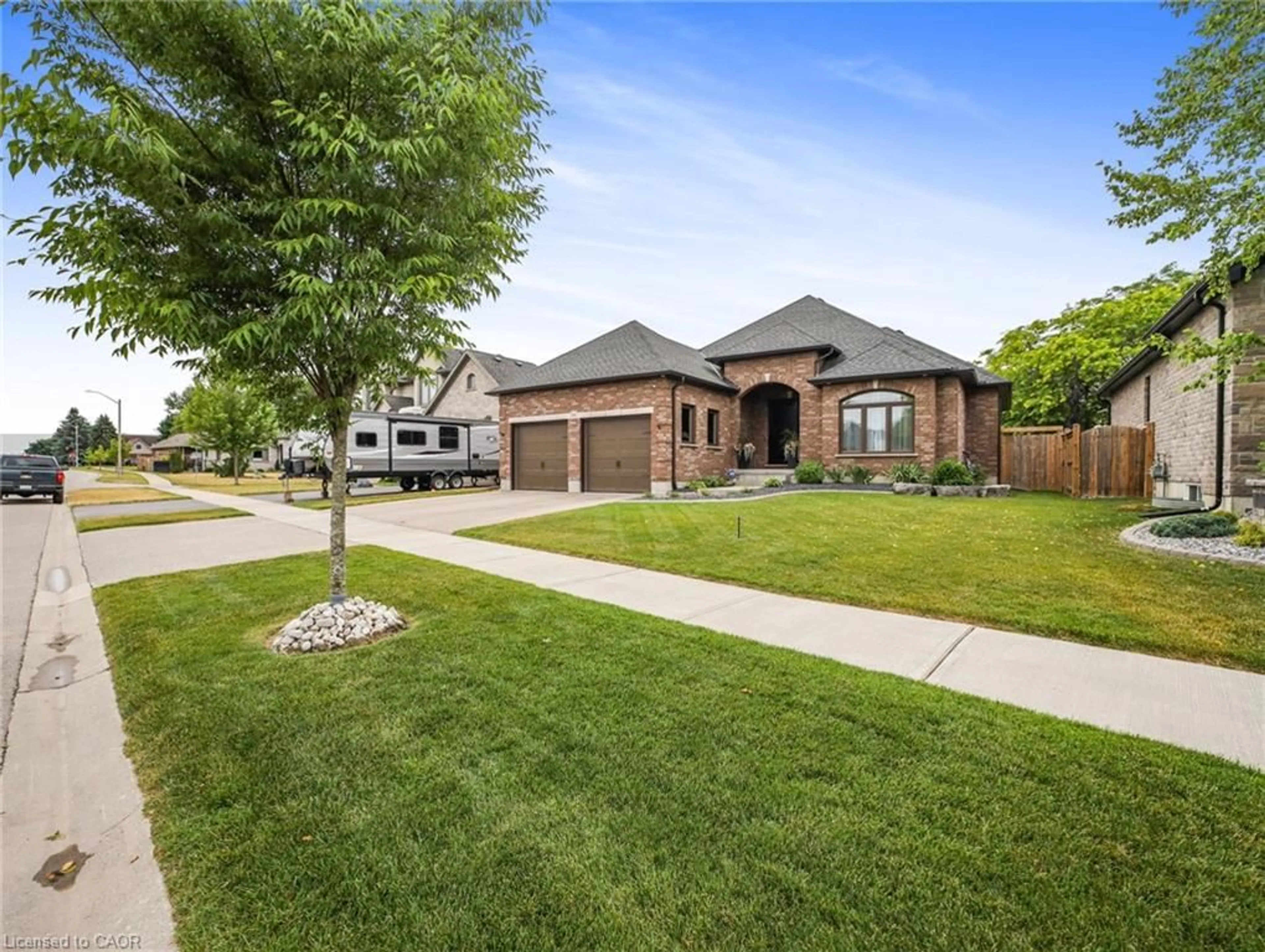 Home with brick exterior material, street for 14 Ross Ave, Simcoe Ontario N3Y 0B2