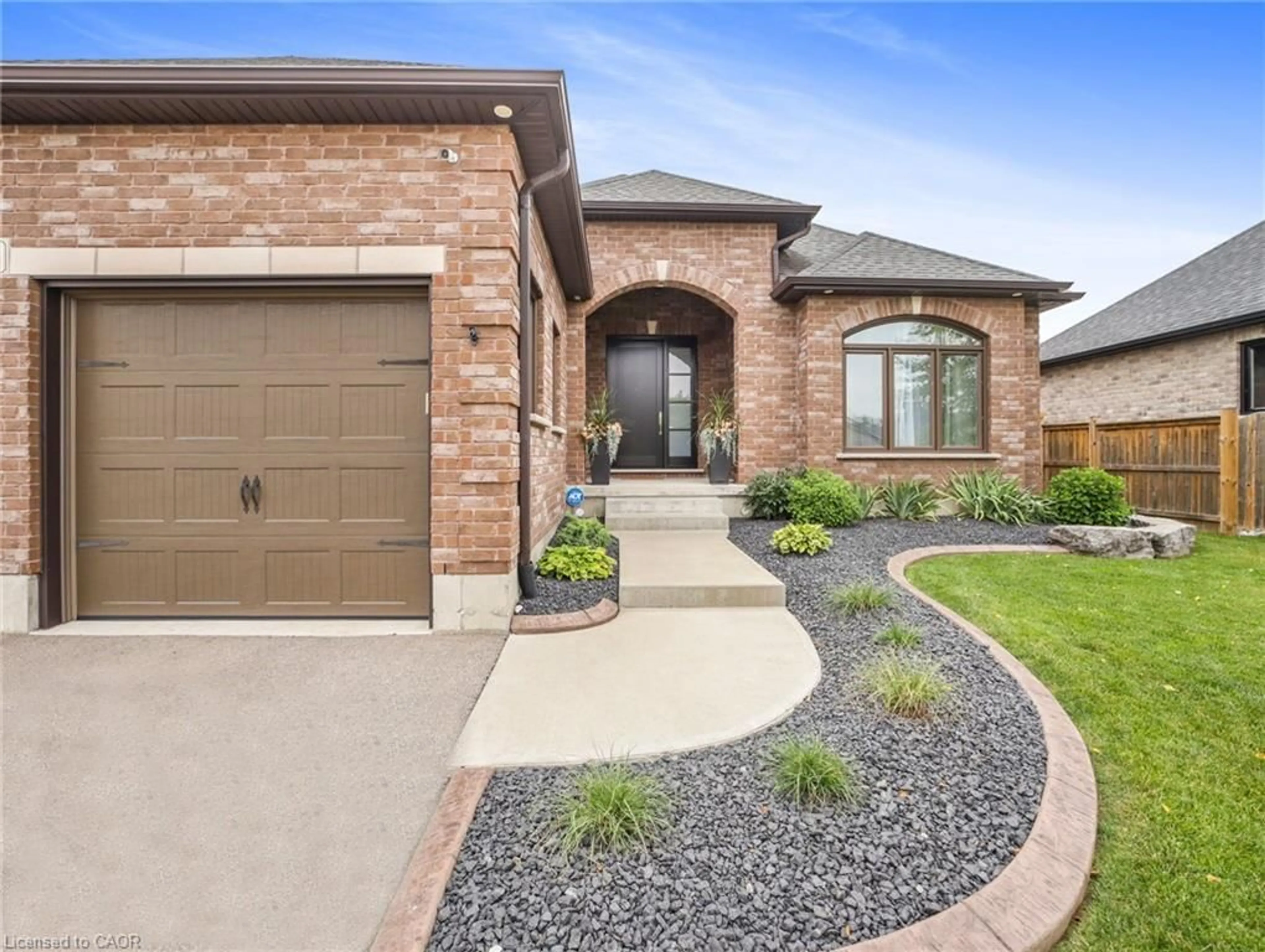 Home with brick exterior material, street for 14 Ross Ave, Simcoe Ontario N3Y 0B2