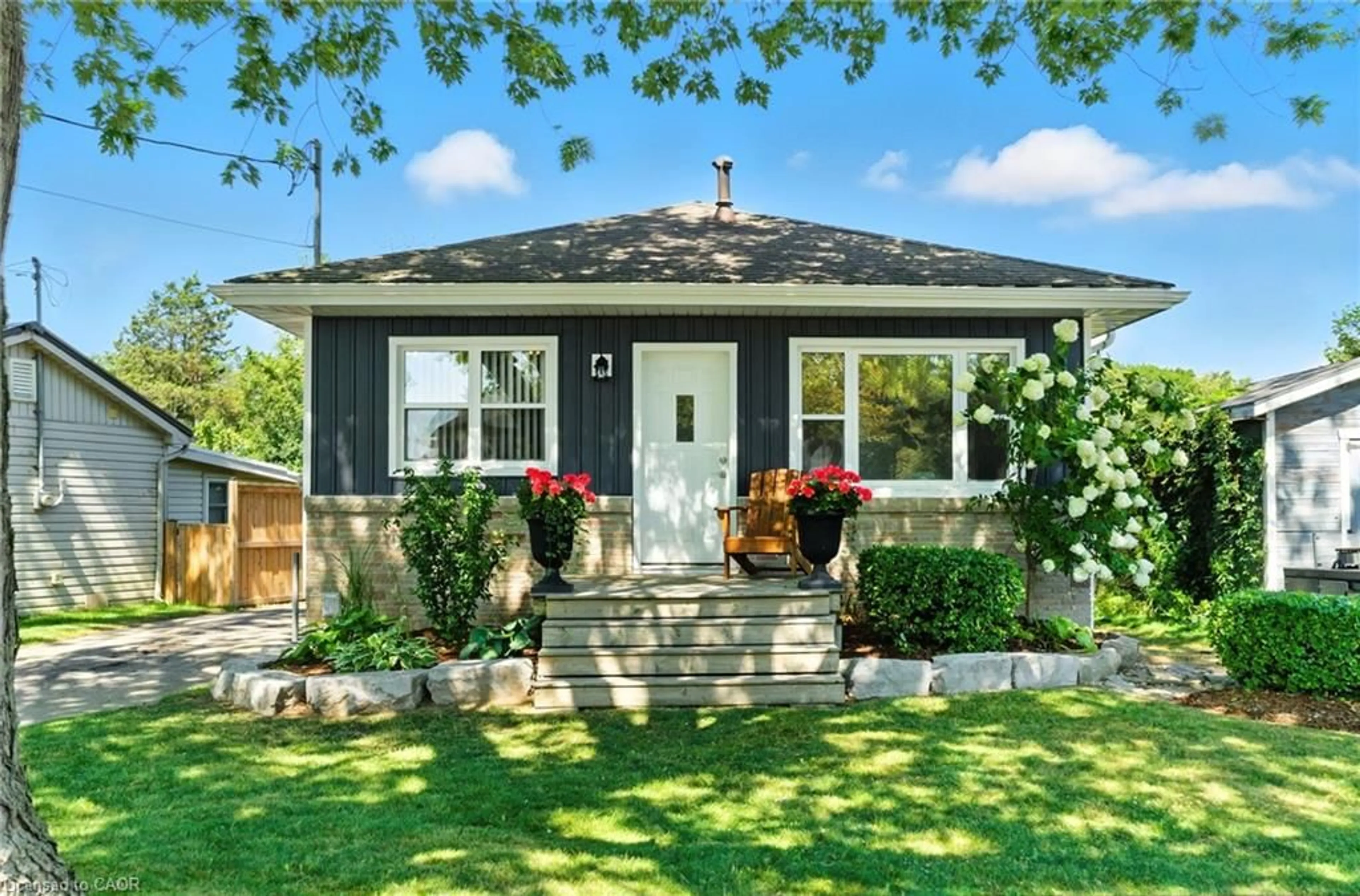 Home with vinyl exterior material, street for 60 Hamilton Plank Rd, Port Dover Ontario N0A 1N7