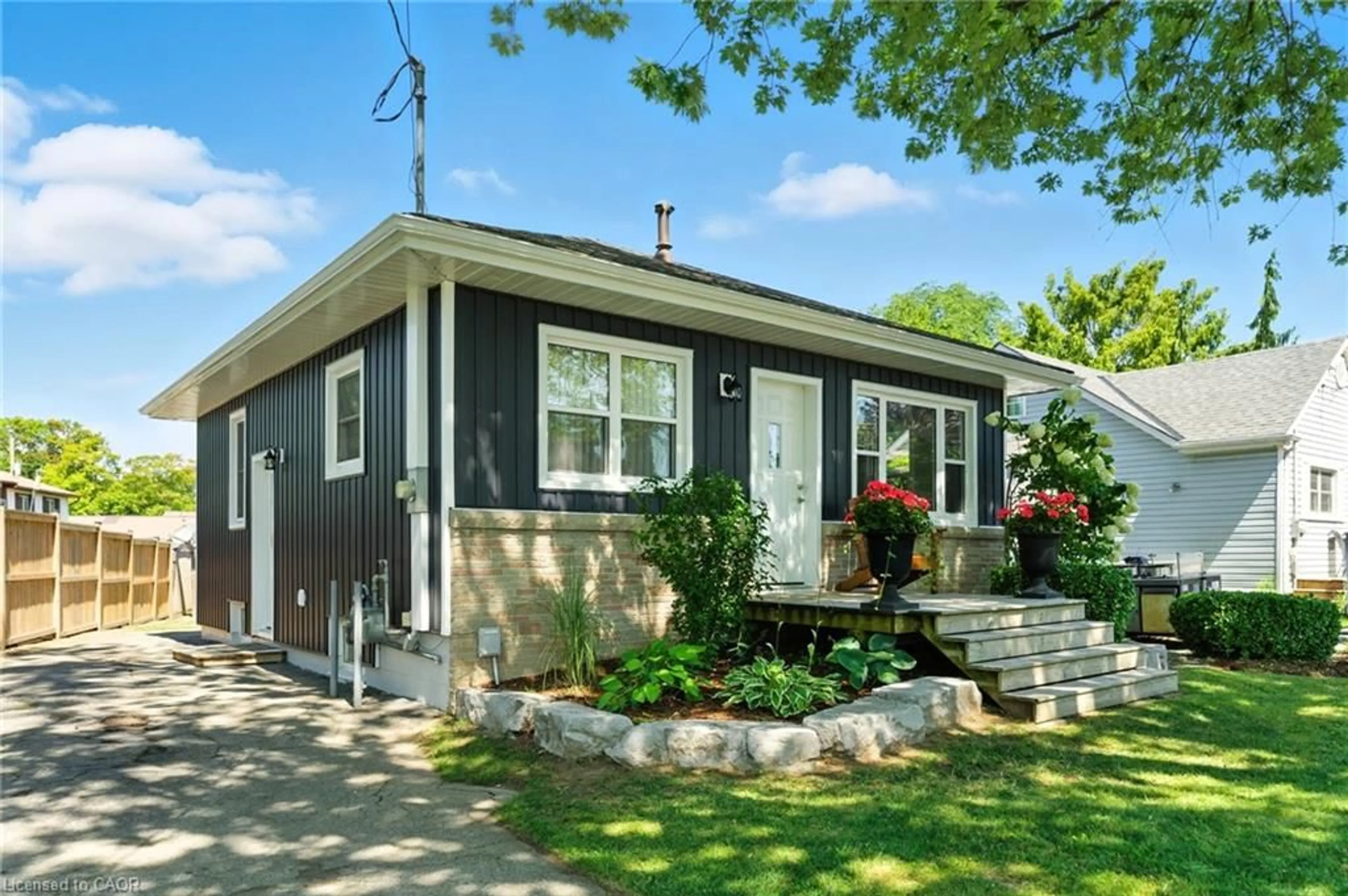 Home with vinyl exterior material, street for 60 Hamilton Plank Rd, Port Dover Ontario N0A 1N7