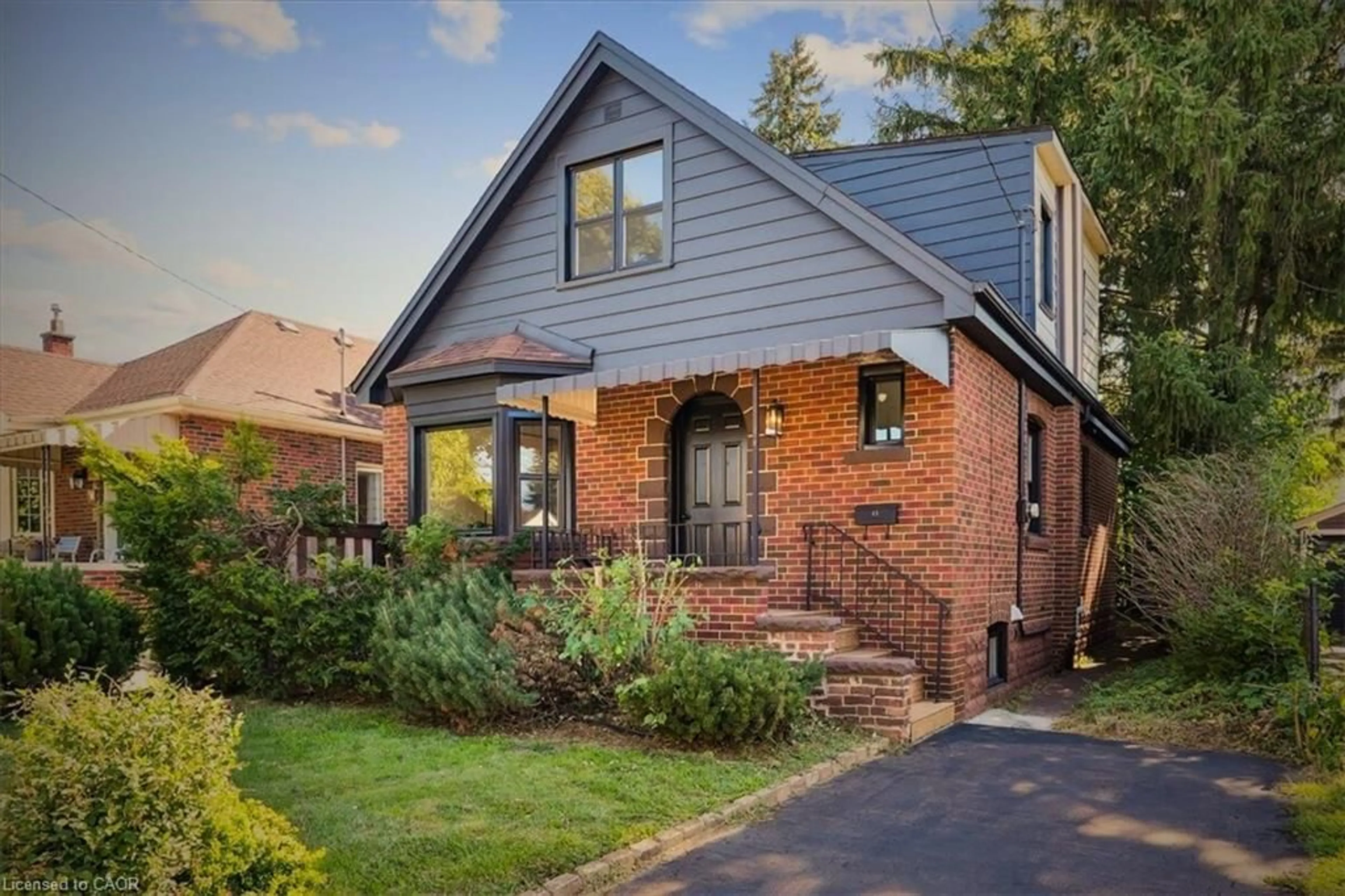 Home with brick exterior material, street for 41 Cameron Ave, Hamilton Ontario L8K 2X1