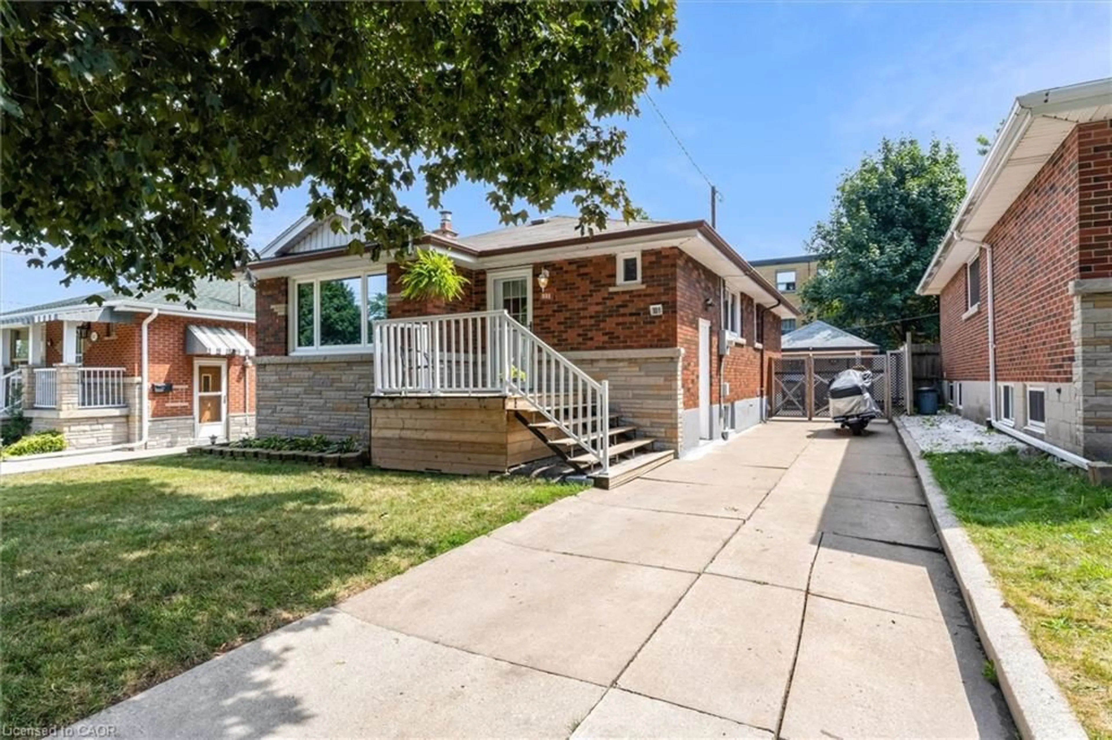 Home with brick exterior material, street for 331 East 42nd St, Hamilton Ontario L8T 3A6