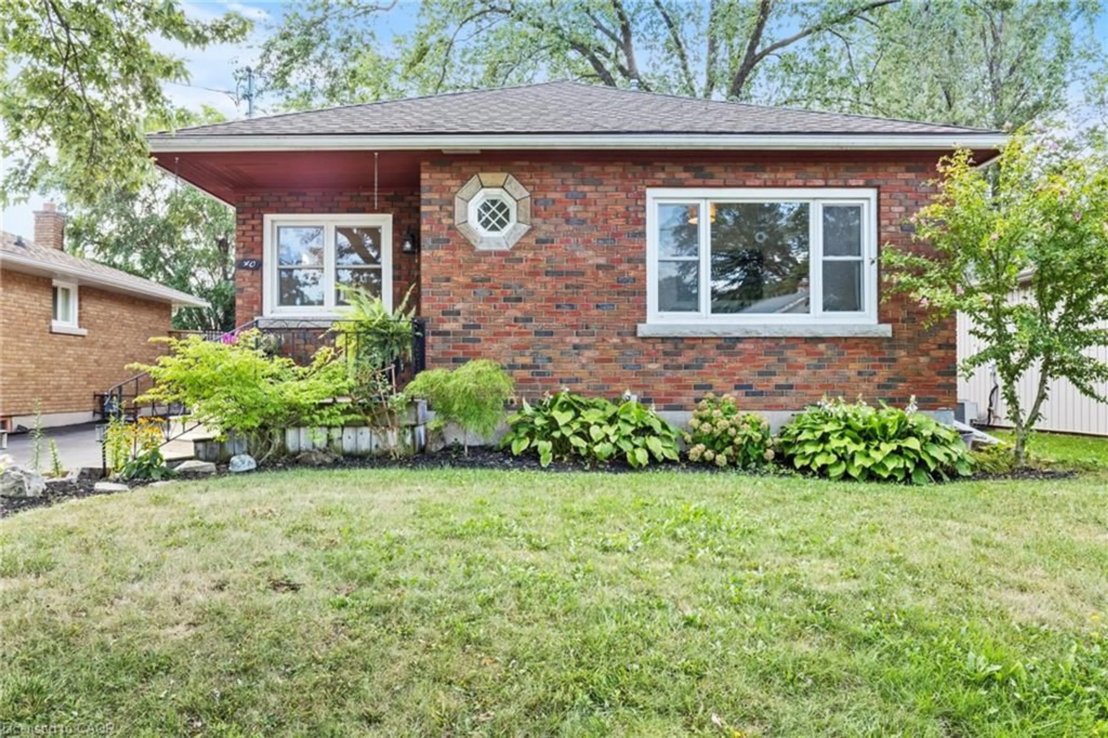 Home with brick exterior material, street for 40 Alexandra Blvd, St. Catharines Ontario L2P 1J9