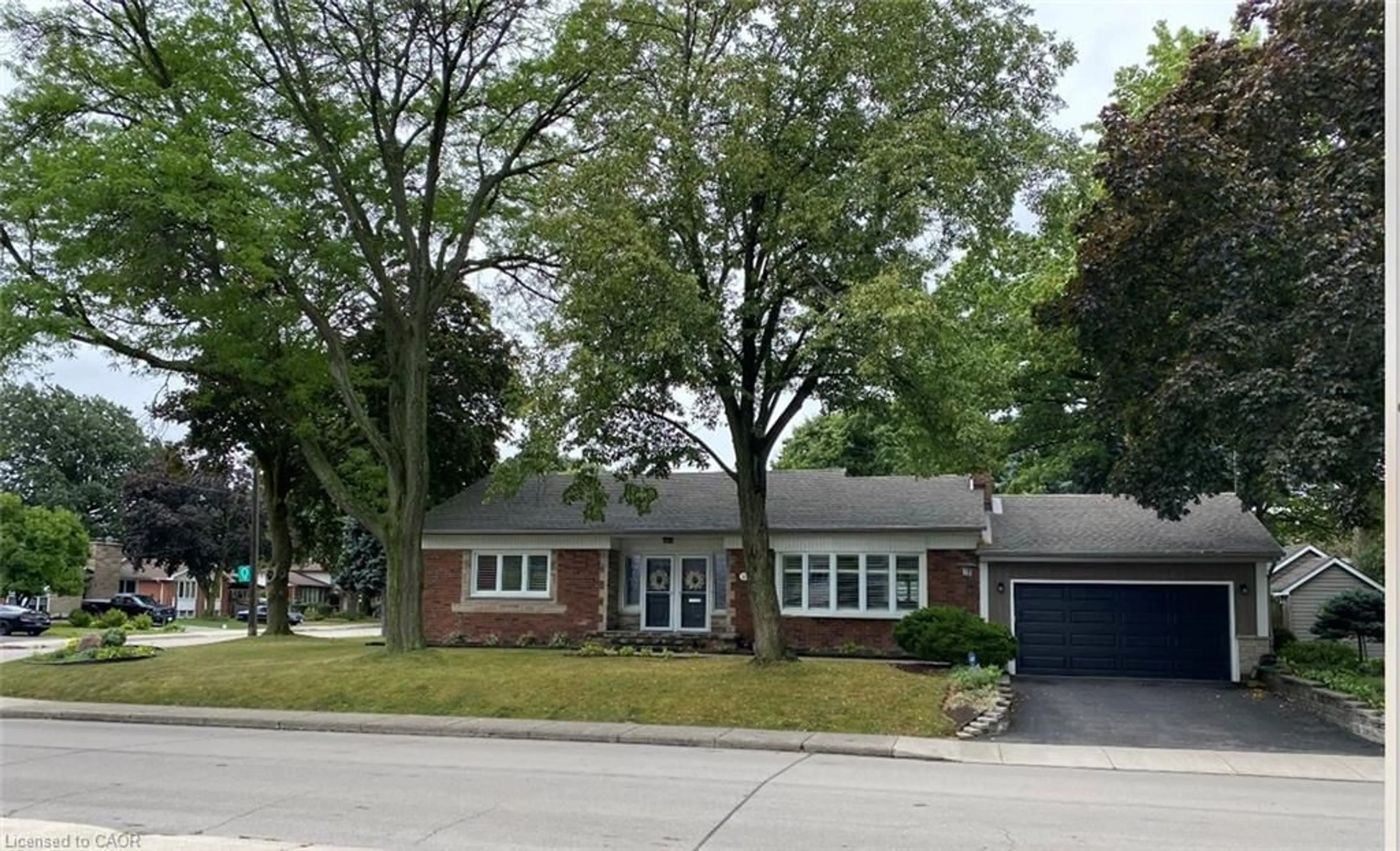 Home with brick exterior material, street for 50 Edgewood Ave, Hamilton Ontario L8T 1K1