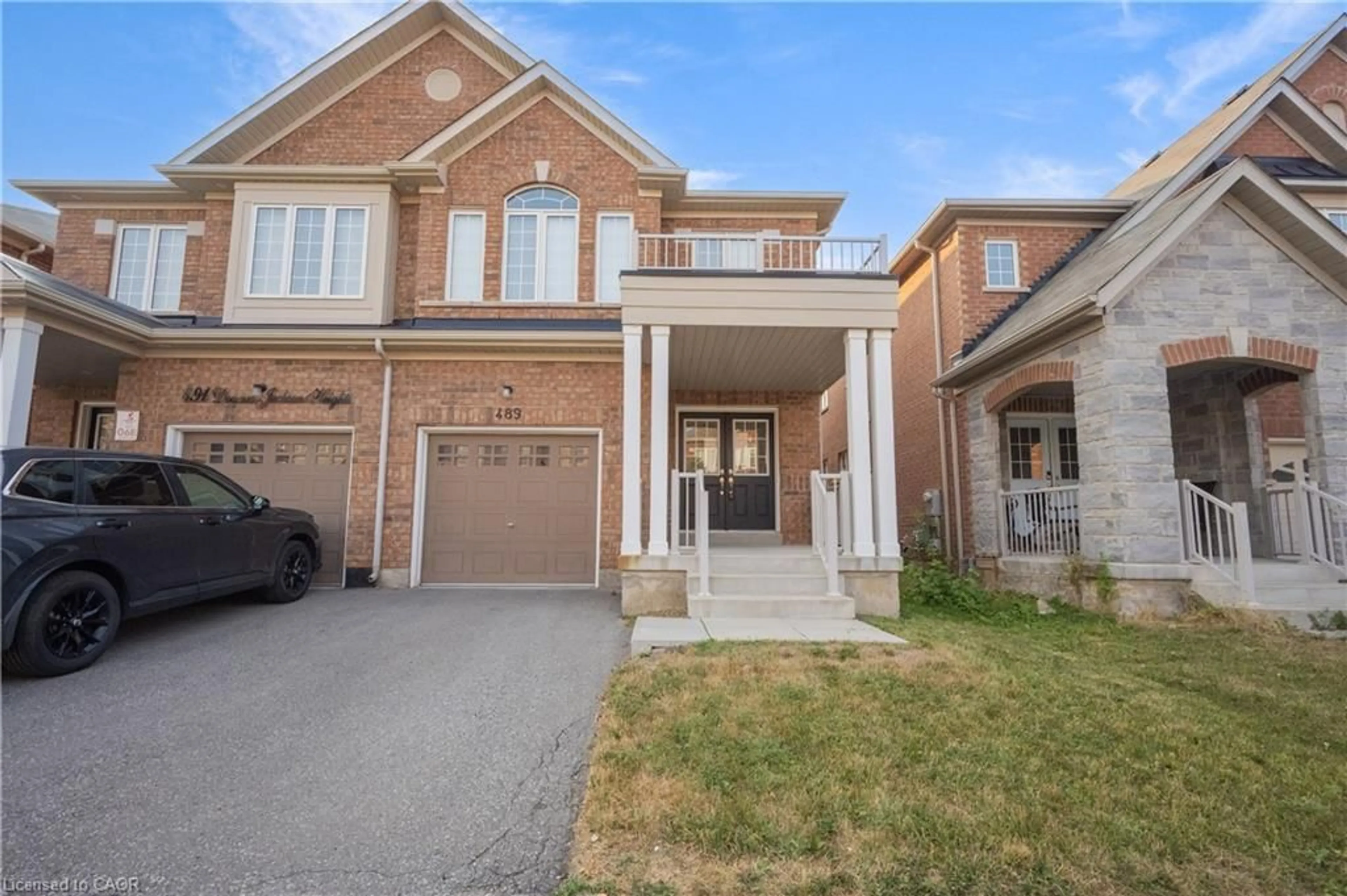 Home with brick exterior material, street for 489 Downes Jackson Hts, Milton Ontario L9T 8W1