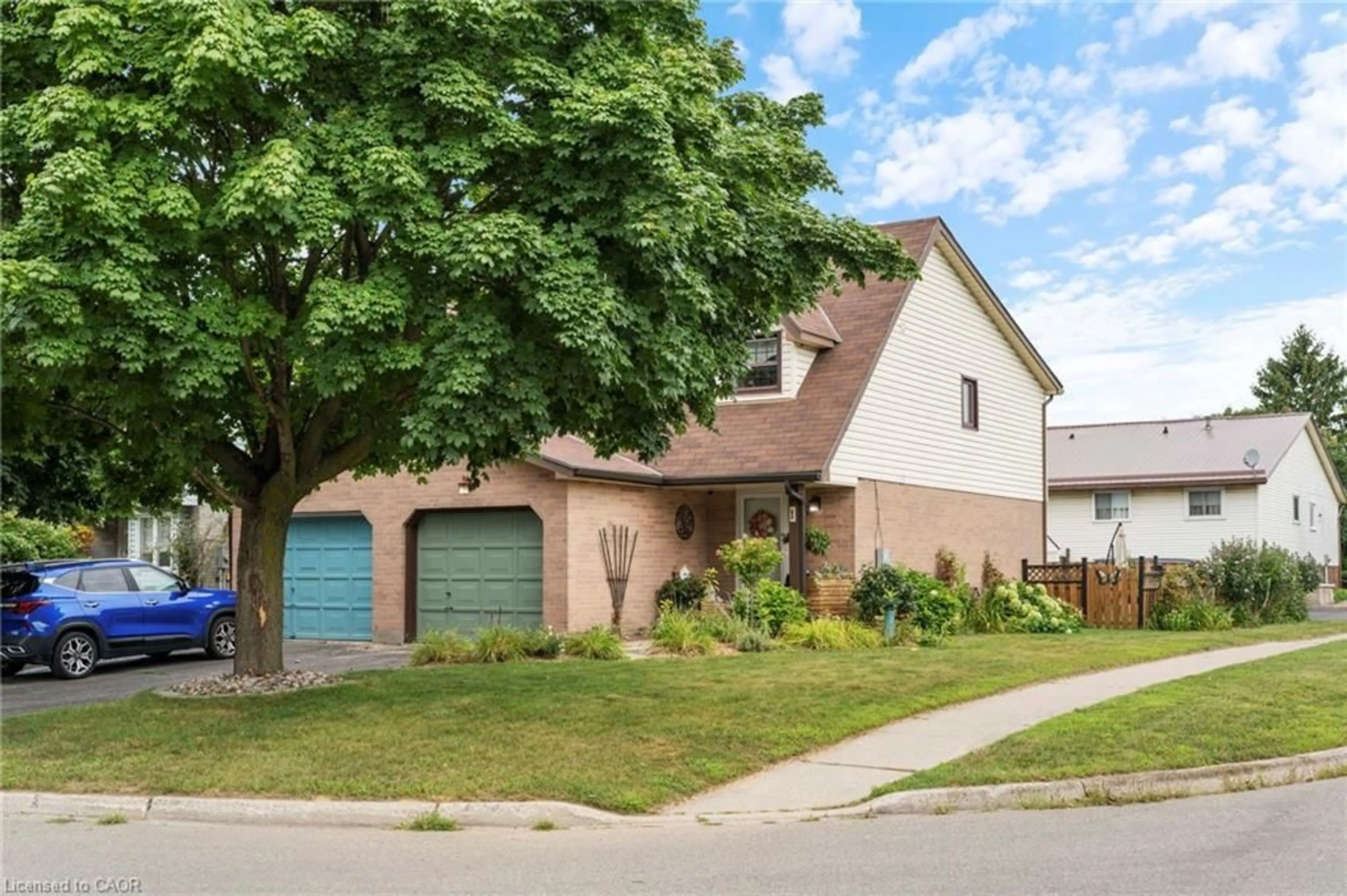 Home with brick exterior material, street for 1 Freeman Cres, Simcoe Ontario N3Y 5J9