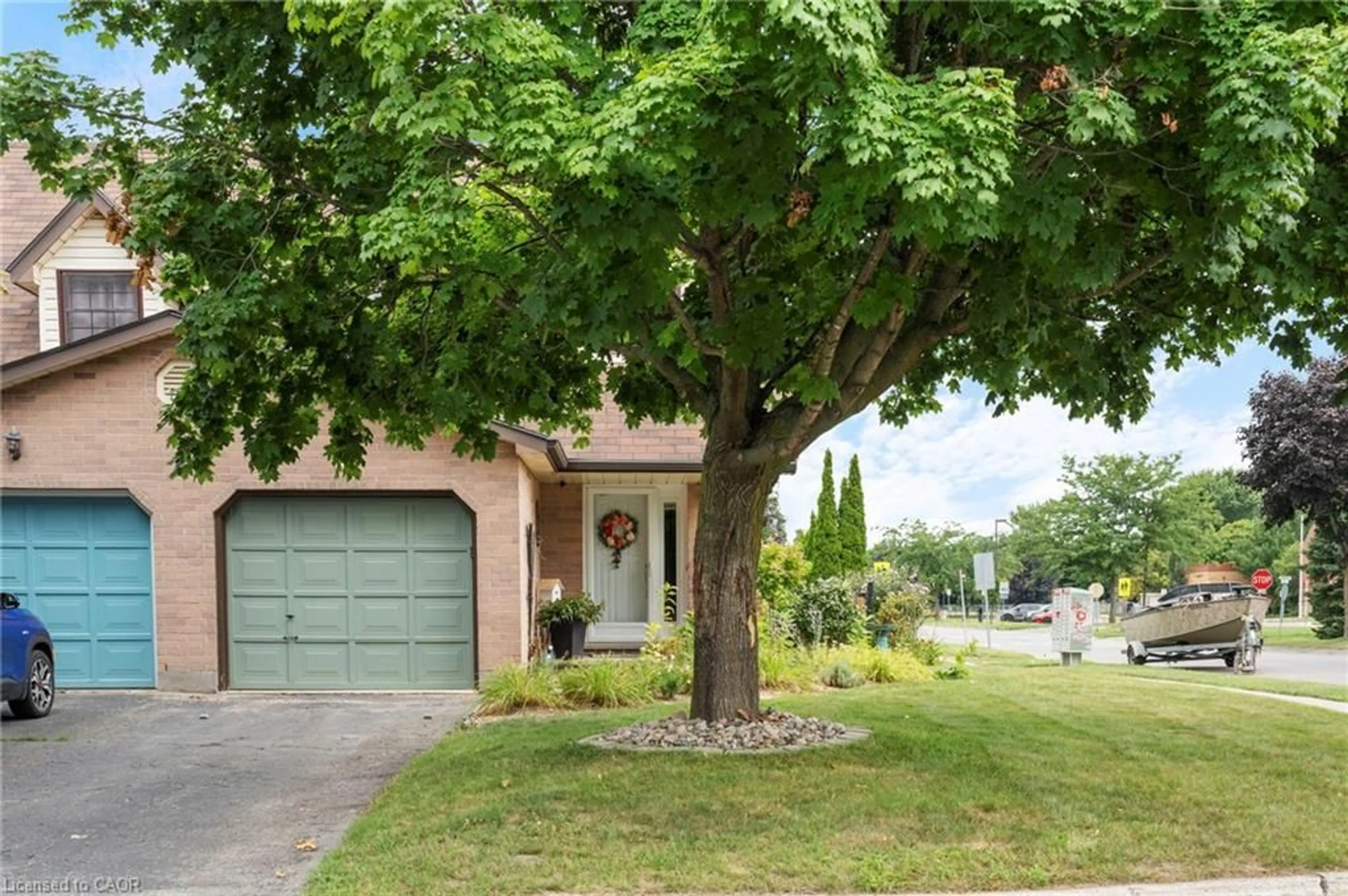Home with brick exterior material, street for 1 Freeman Cres, Simcoe Ontario N3Y 5J9