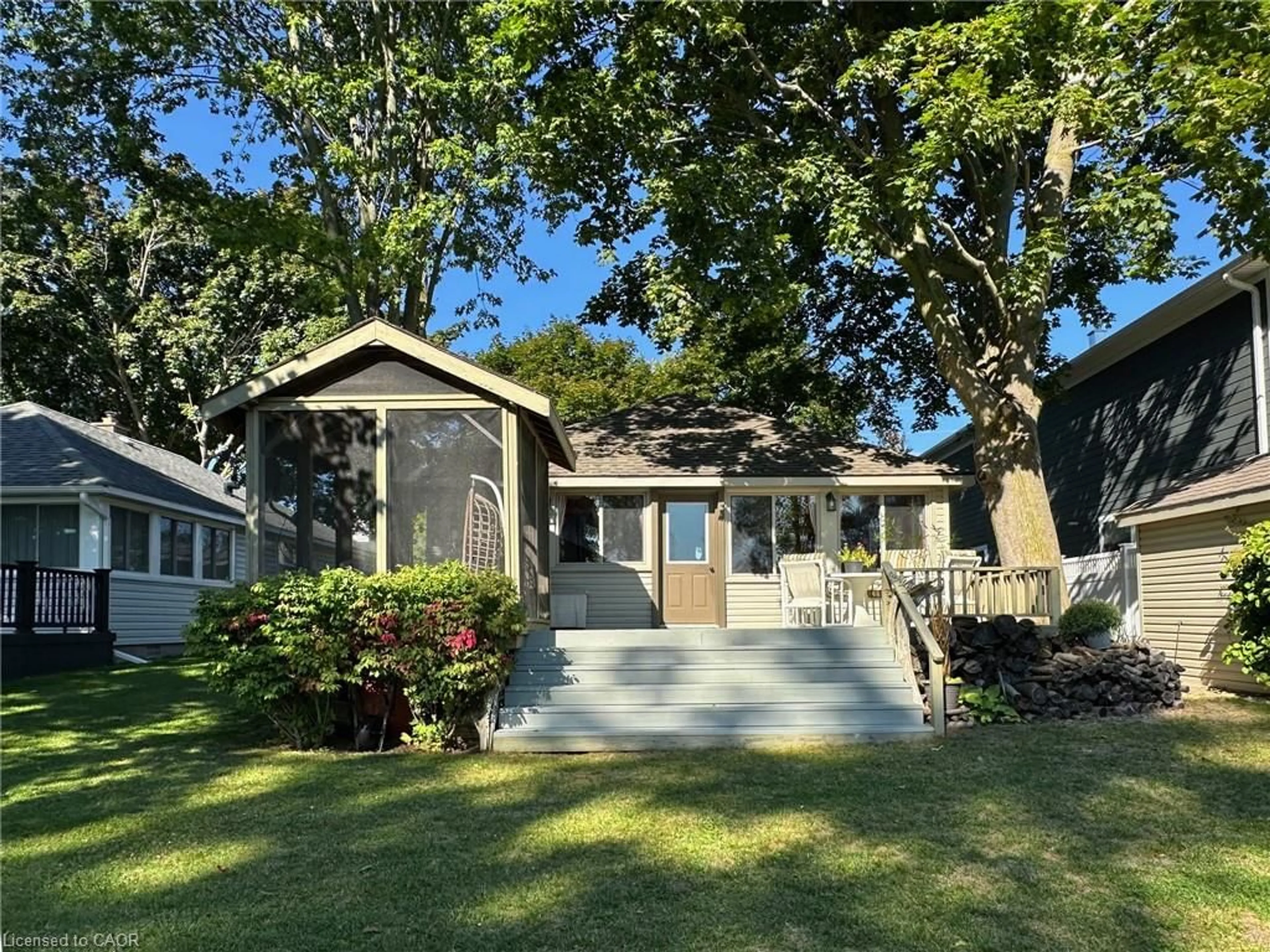 Home with vinyl exterior material, street for 148 Cedar Dr Dr, Turkey Point Ontario N0E 1T0