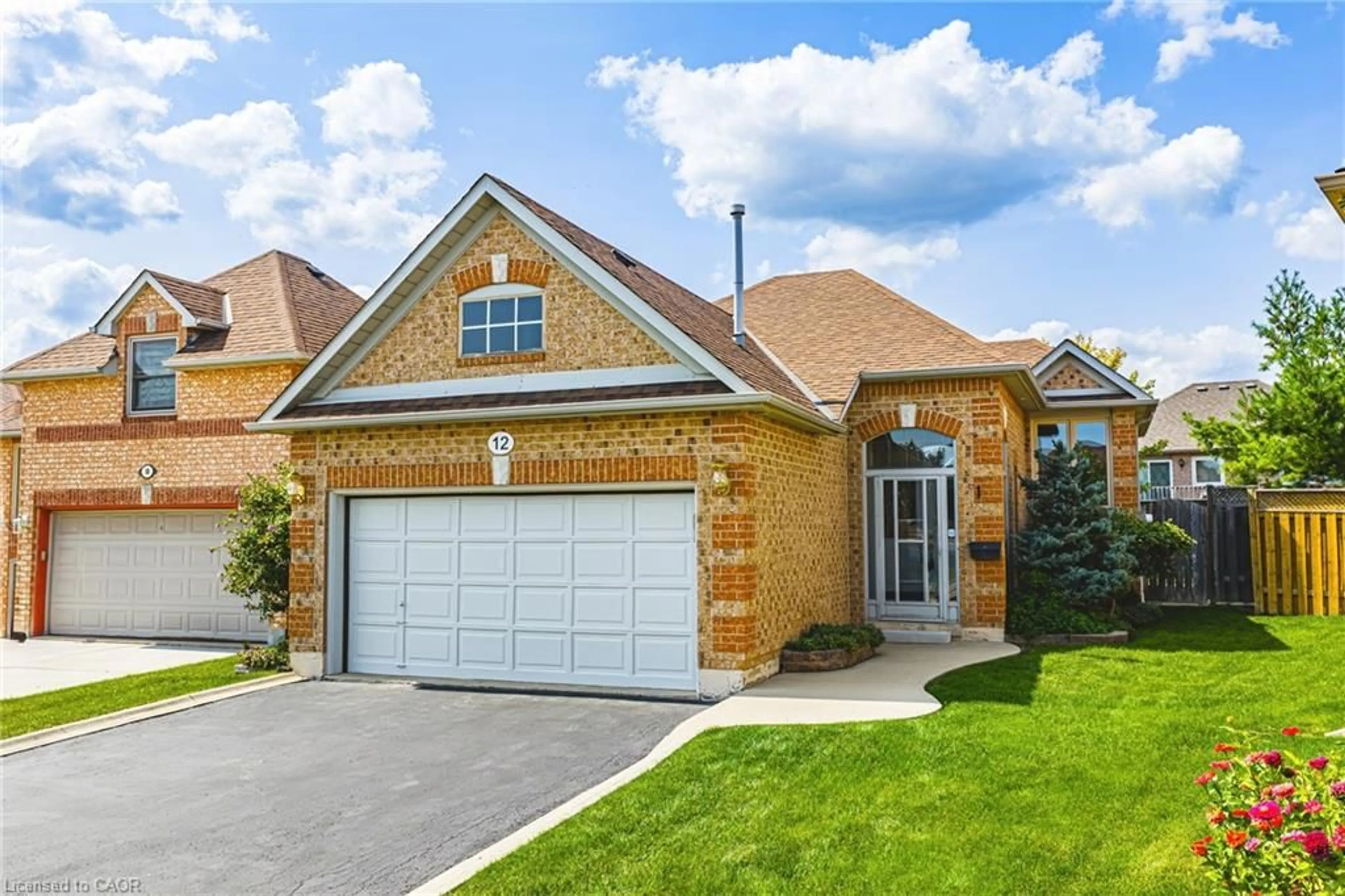 Home with brick exterior material, street for 12 Summerfield Cres, Brampton Ontario L6X 4L3