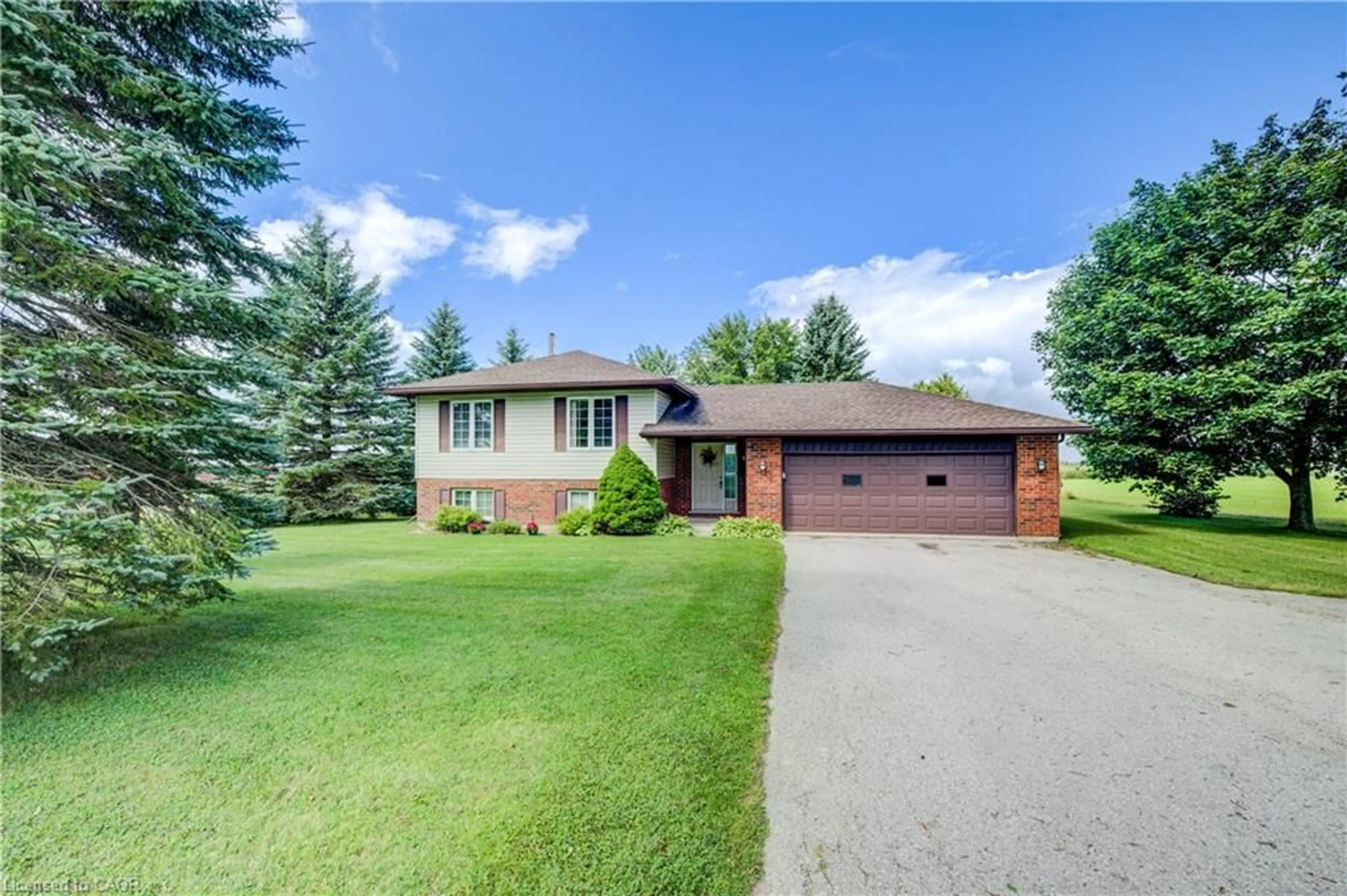 A pic from outside/outdoor area/front of a property/back of a property/a pic from drone, street for 9340 Concession 6 N, Wellington North Ontario N0G 2L0