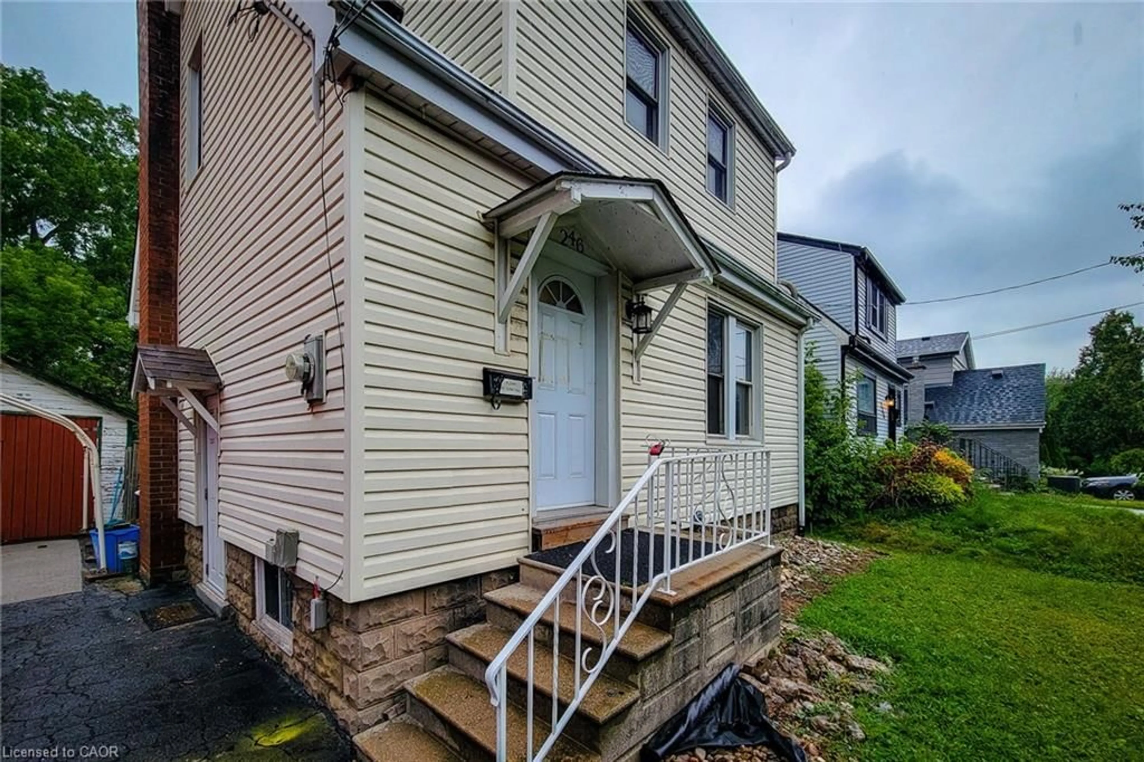 Home with vinyl exterior material, street for 246 Bowman St, Hamilton Ontario L8S 2V2