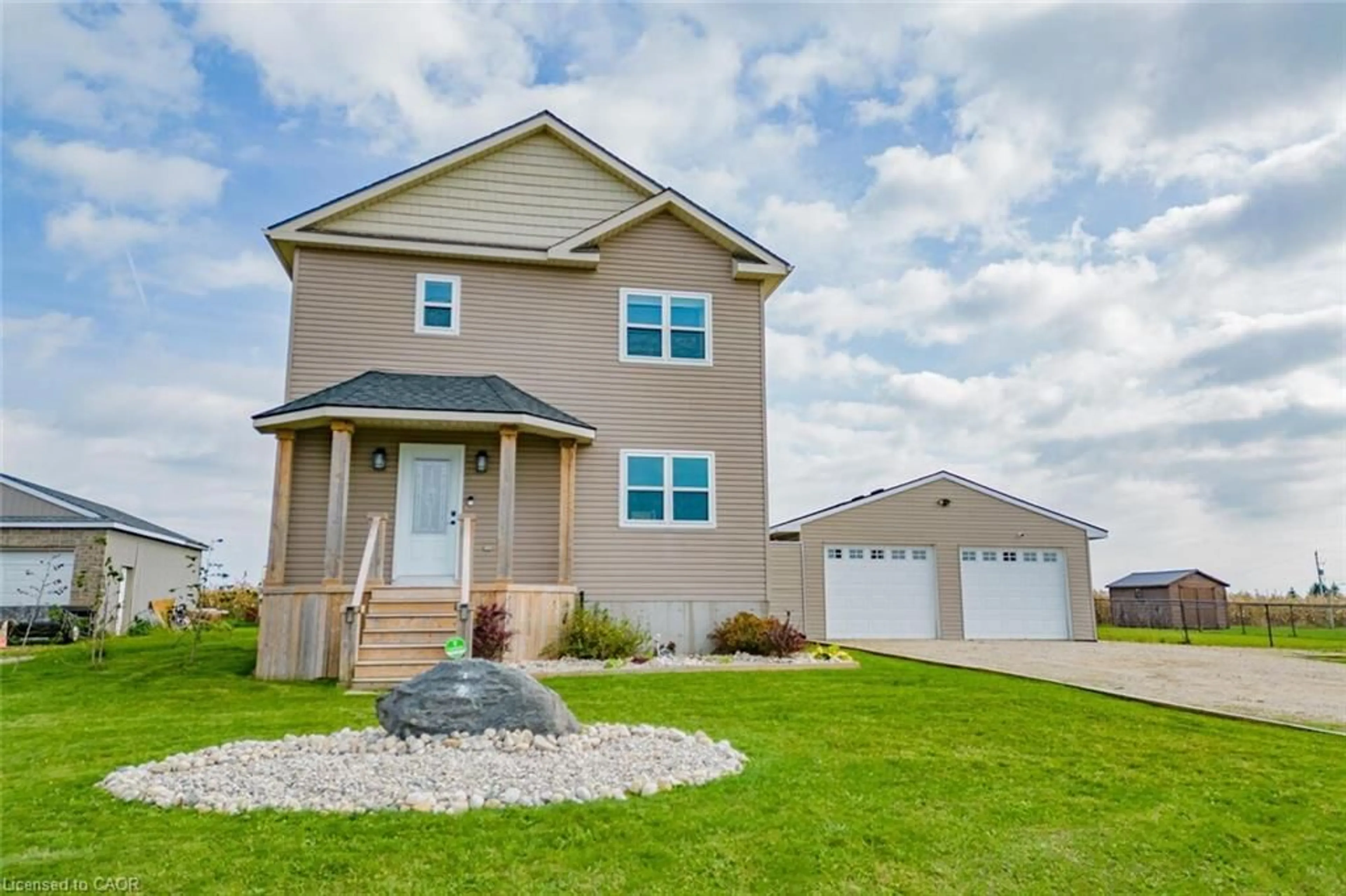 Home with vinyl exterior material, street for 1076 Brussels Line, Wroxeter Ontario N0G 2X0