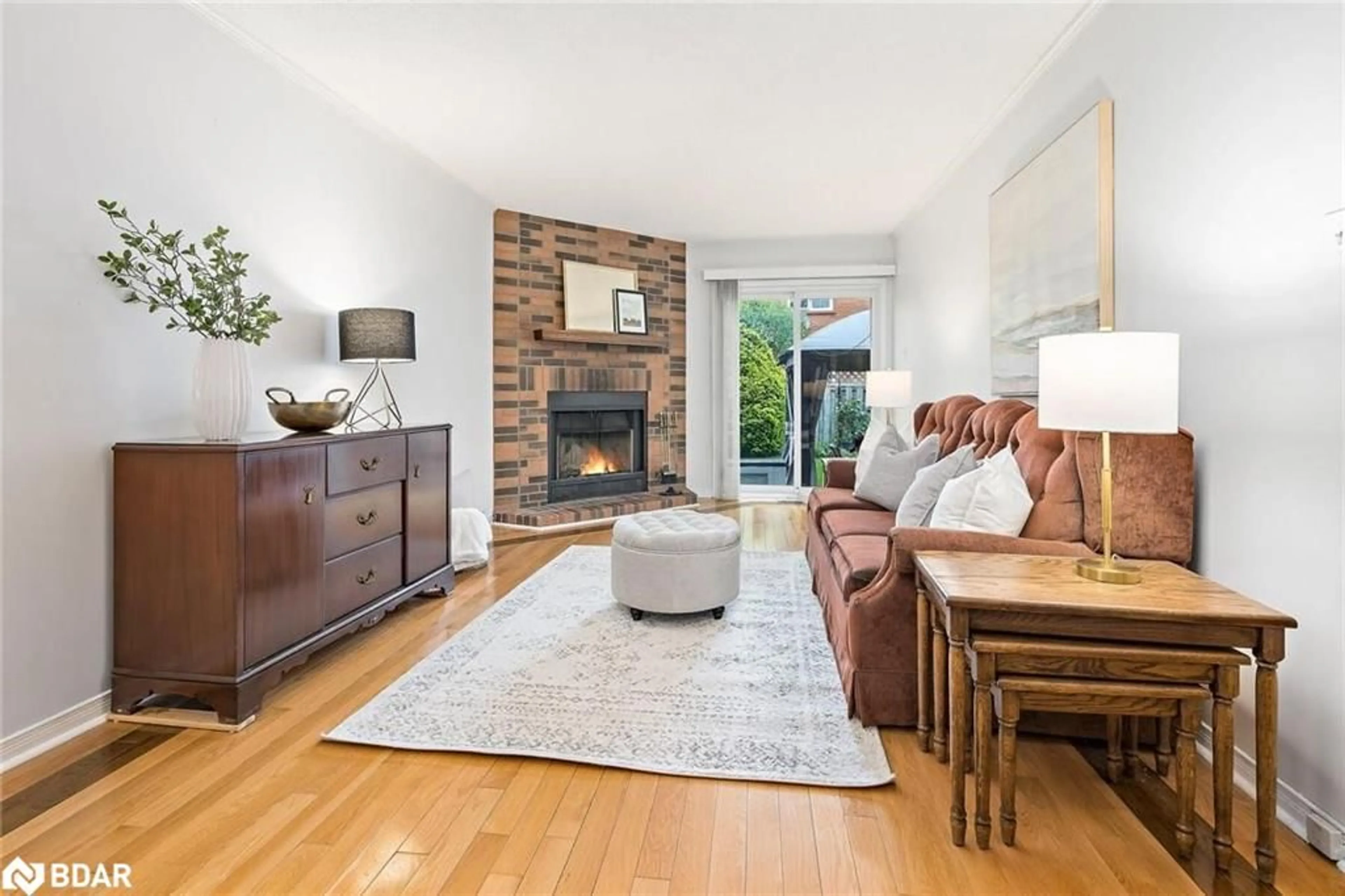 Living room with furniture, wood/laminate floor for 262 Murray St, Brampton Ontario L6X 3T4