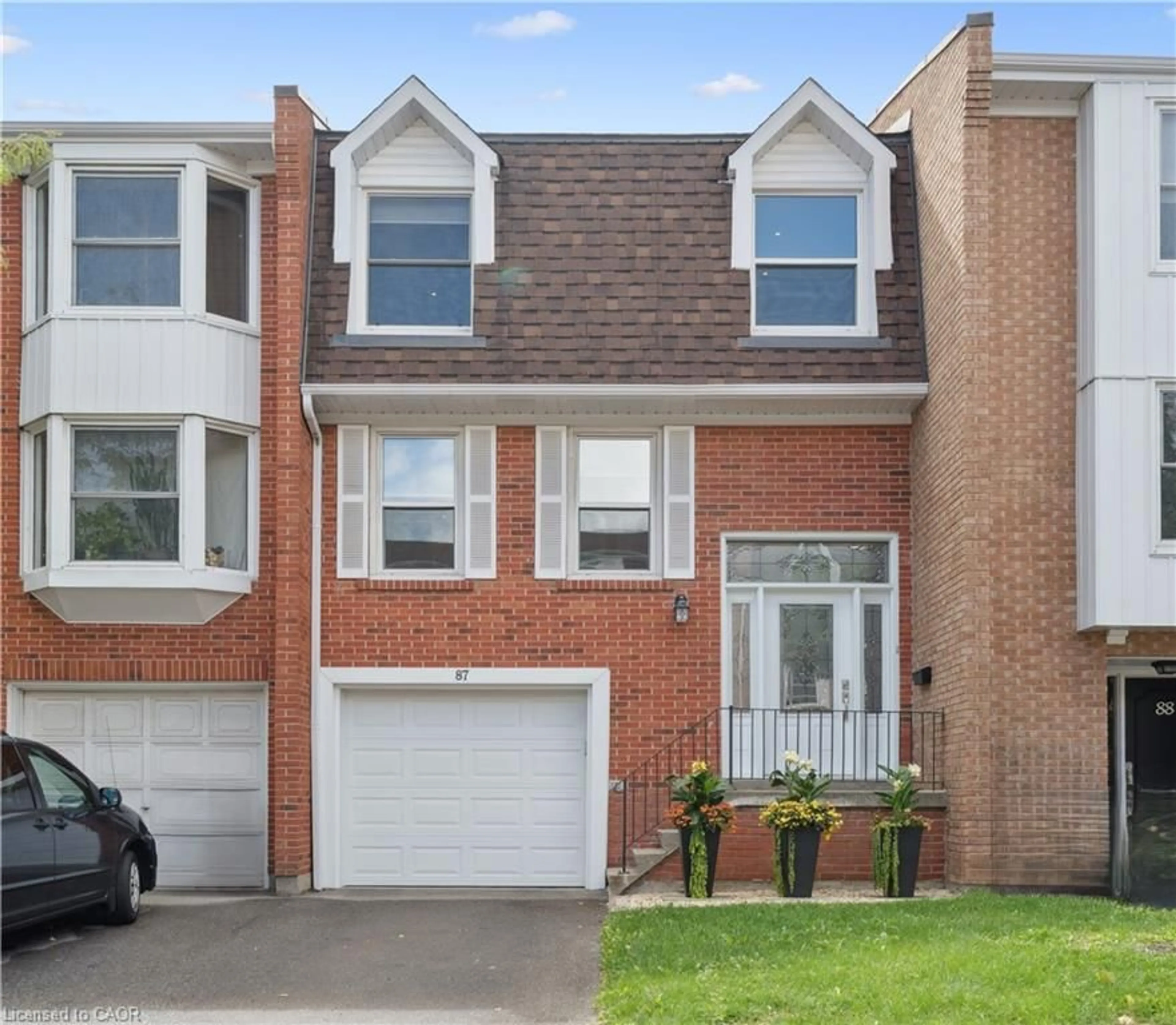 Home with brick exterior material, street for 333 Meadows Blvd #87, Mississauga Ontario L4Z 1G9