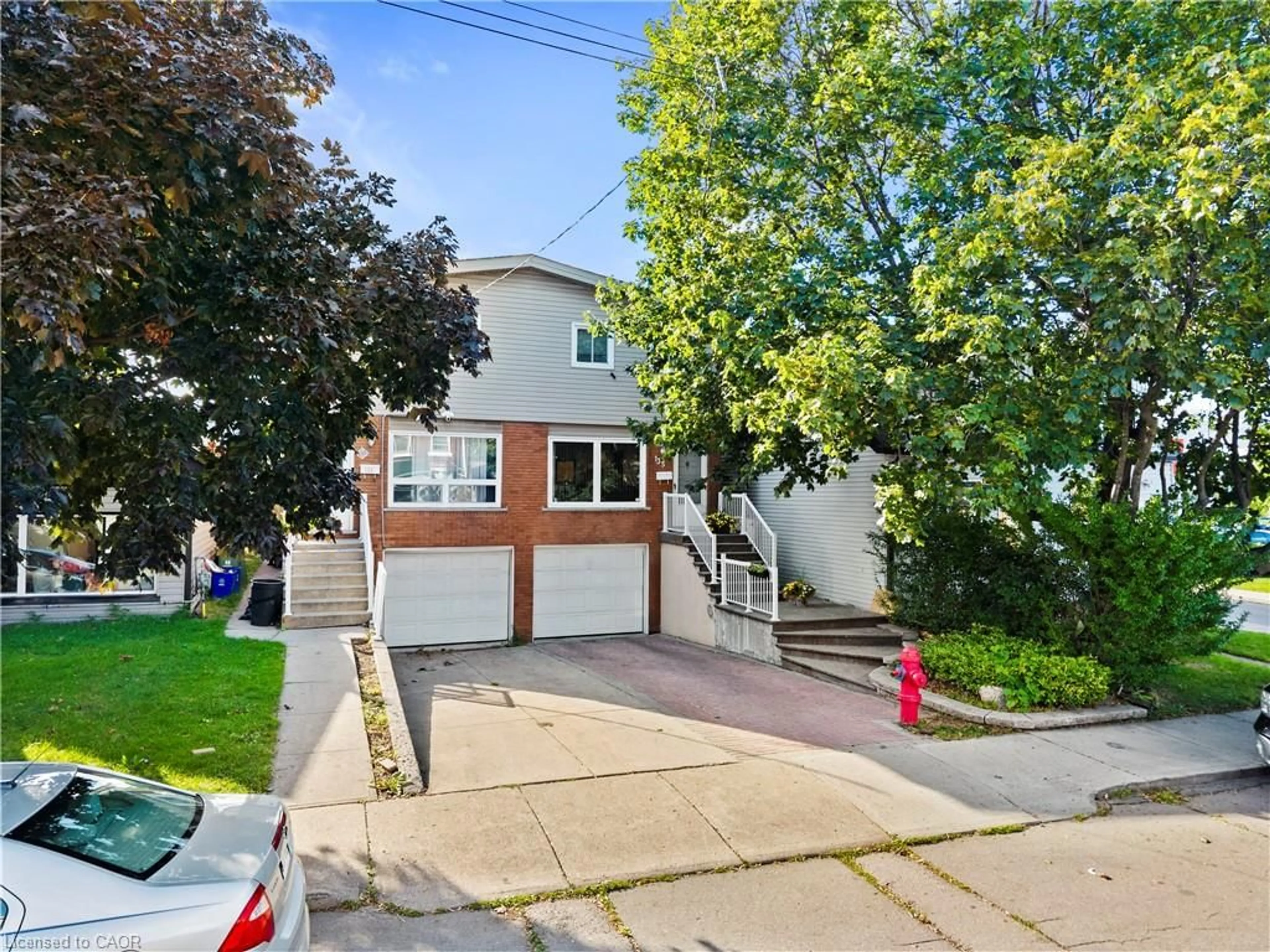 Home with brick exterior material, street for 135 West Ave, Hamilton Ontario L8L 5C4