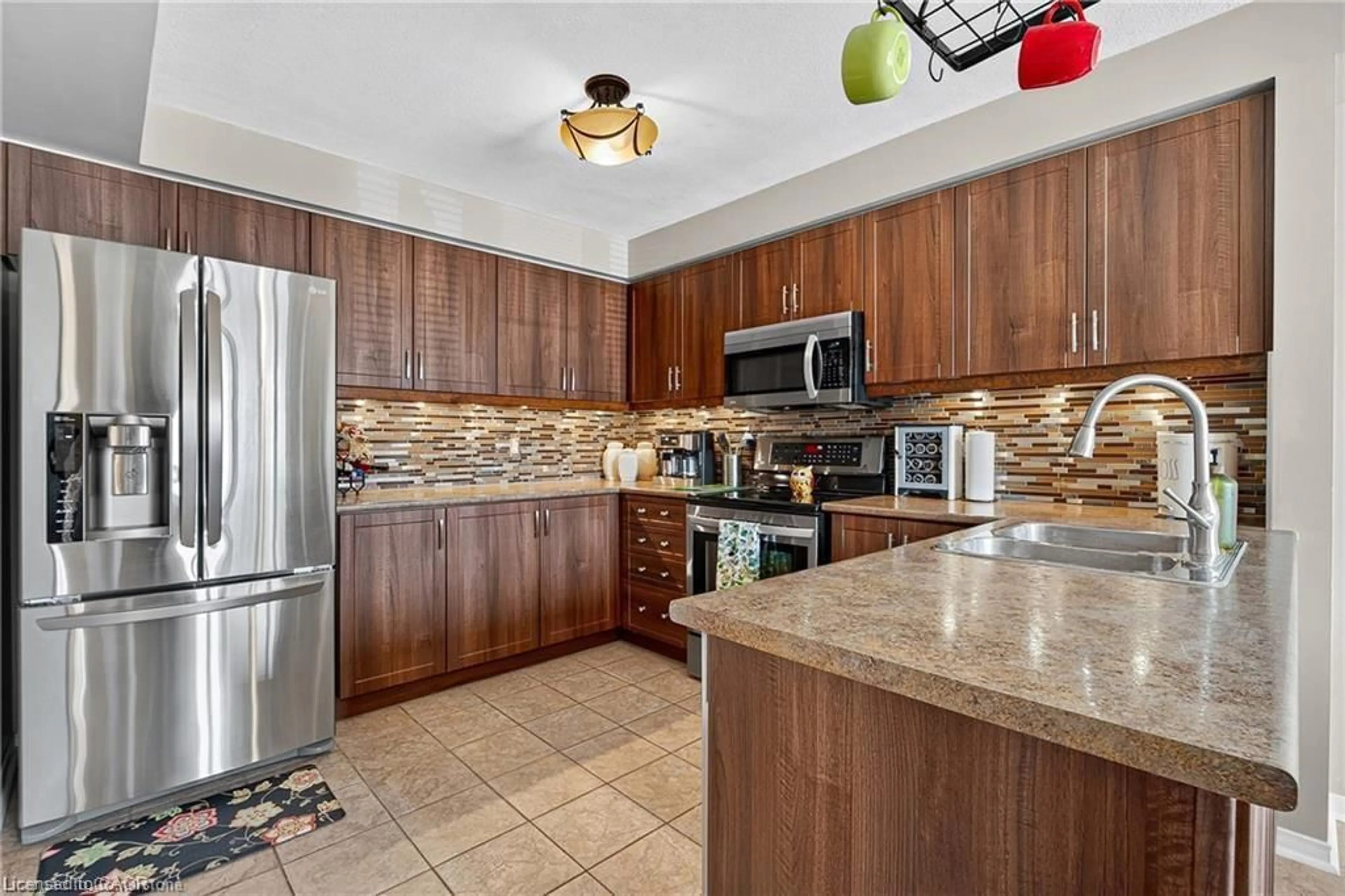 Open concept kitchen, ceramic/tile floor for 302 College Ave #119, Guelph Ontario N1G 4T6