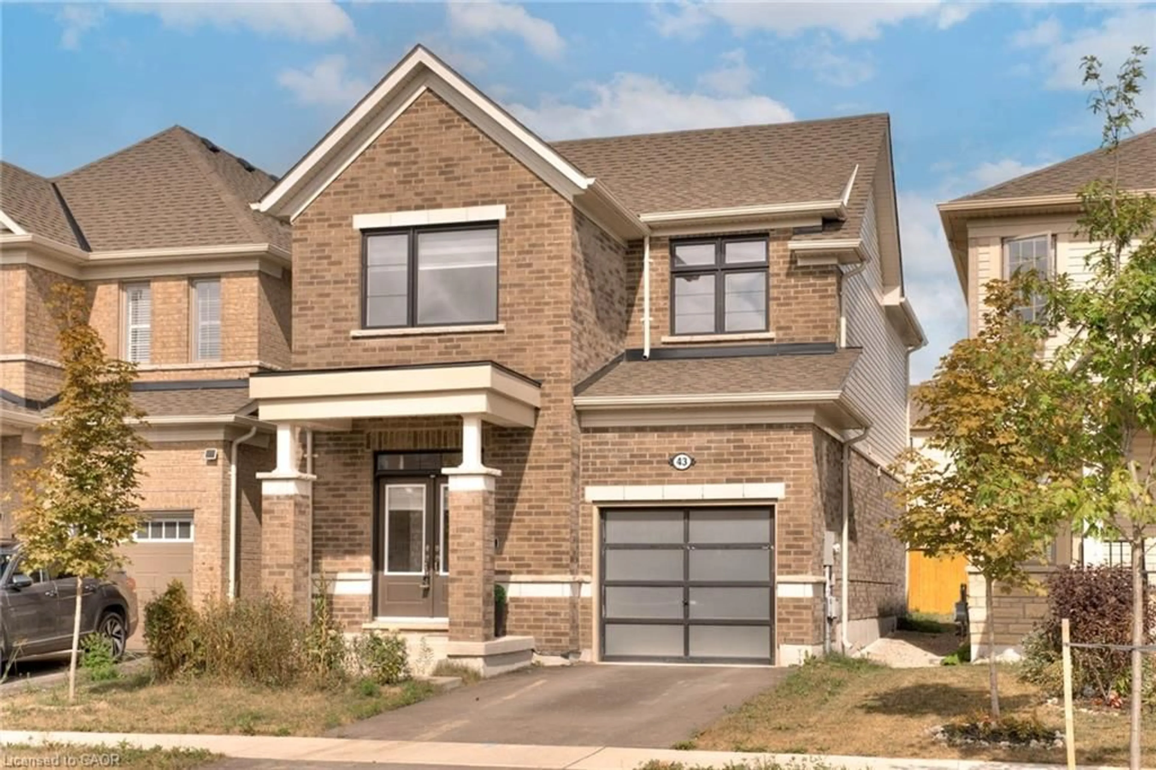 Home with brick exterior material, street for 43 Dass Dr, Fergus Ontario N1M 0H9