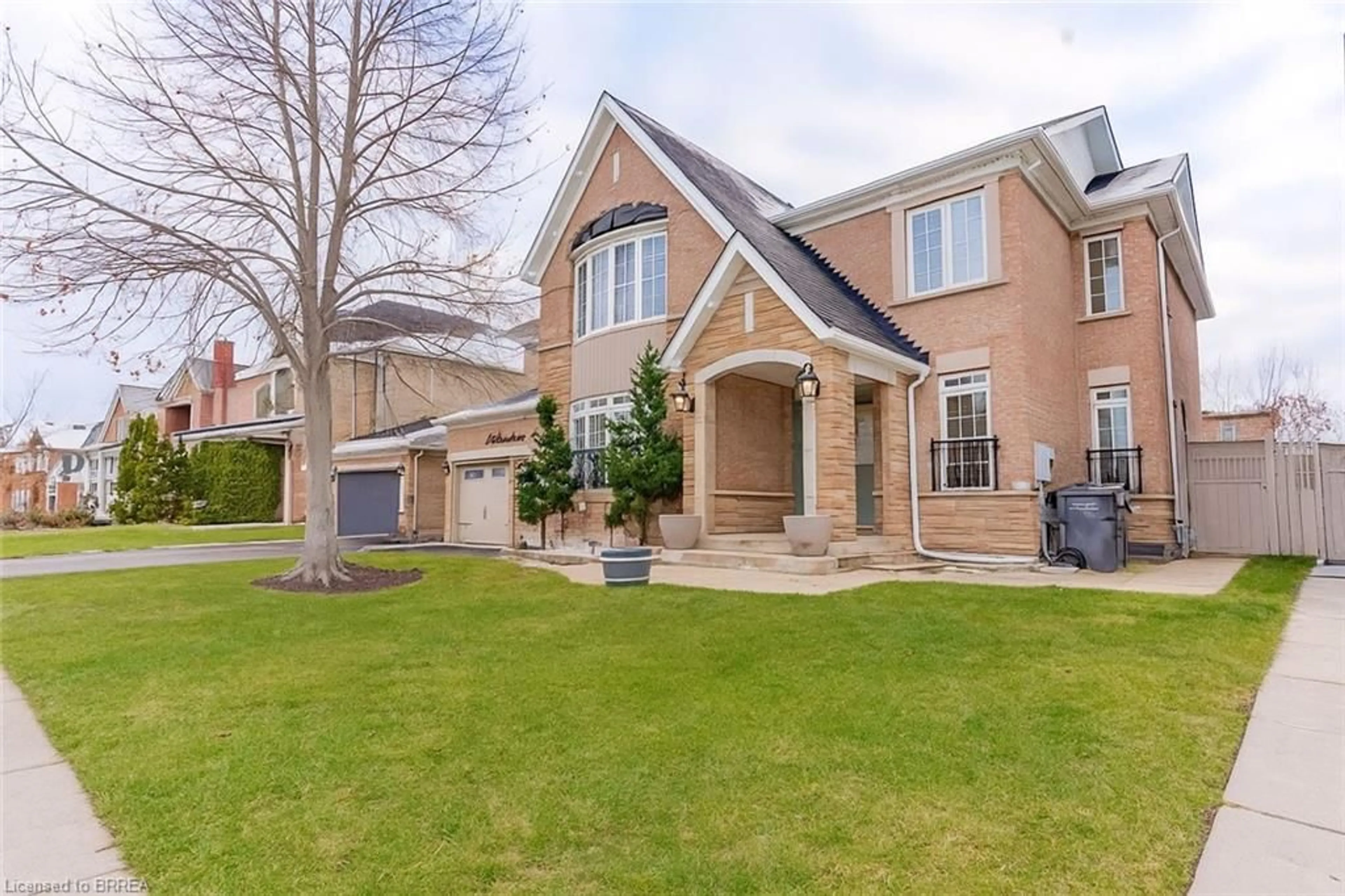 Home with brick exterior material, street for 39 Huntspoint Dr, Brampton Ontario L6P 2E9