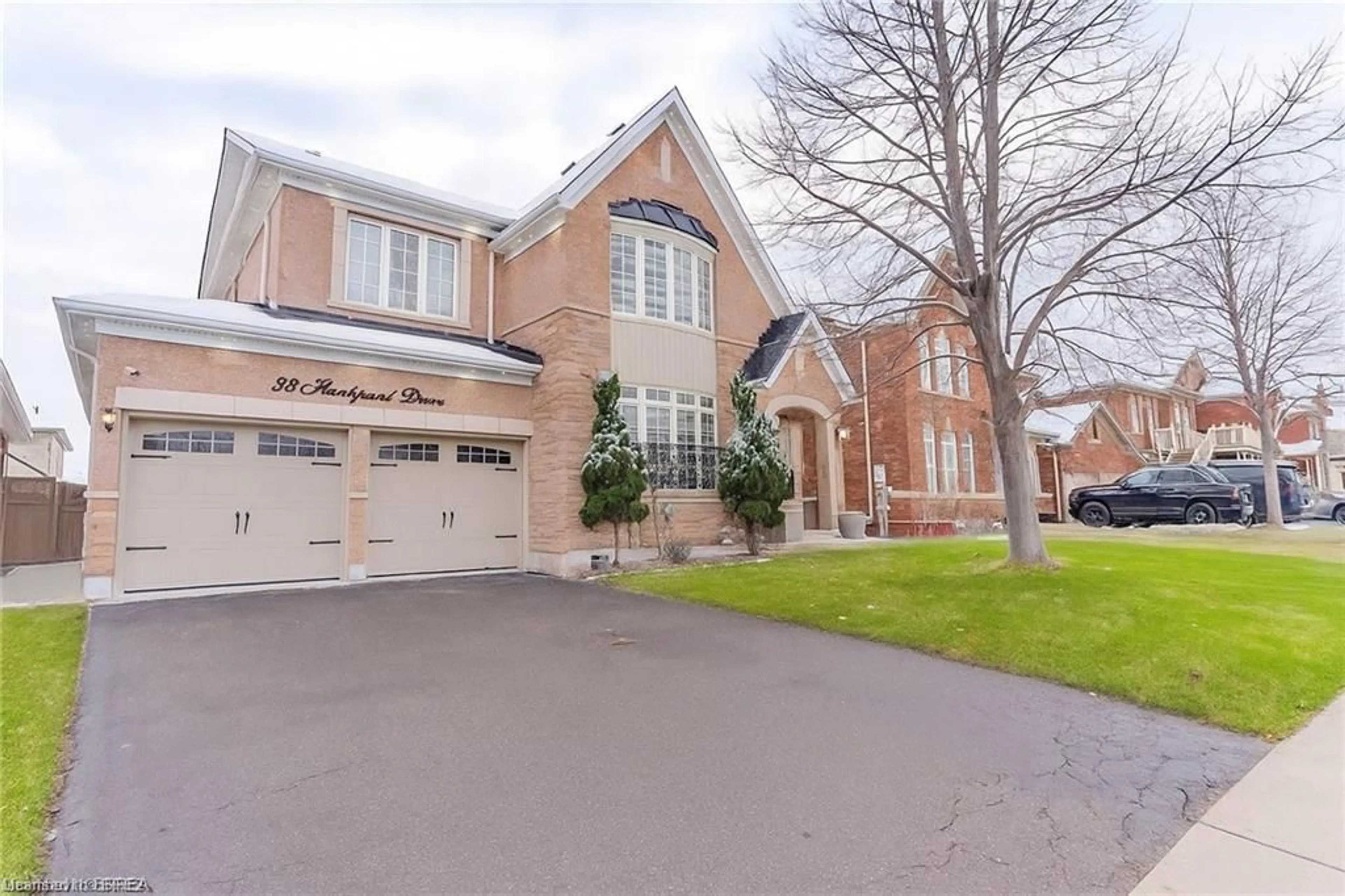 Home with brick exterior material, street for 39 Huntspoint Dr, Brampton Ontario L6P 2E9