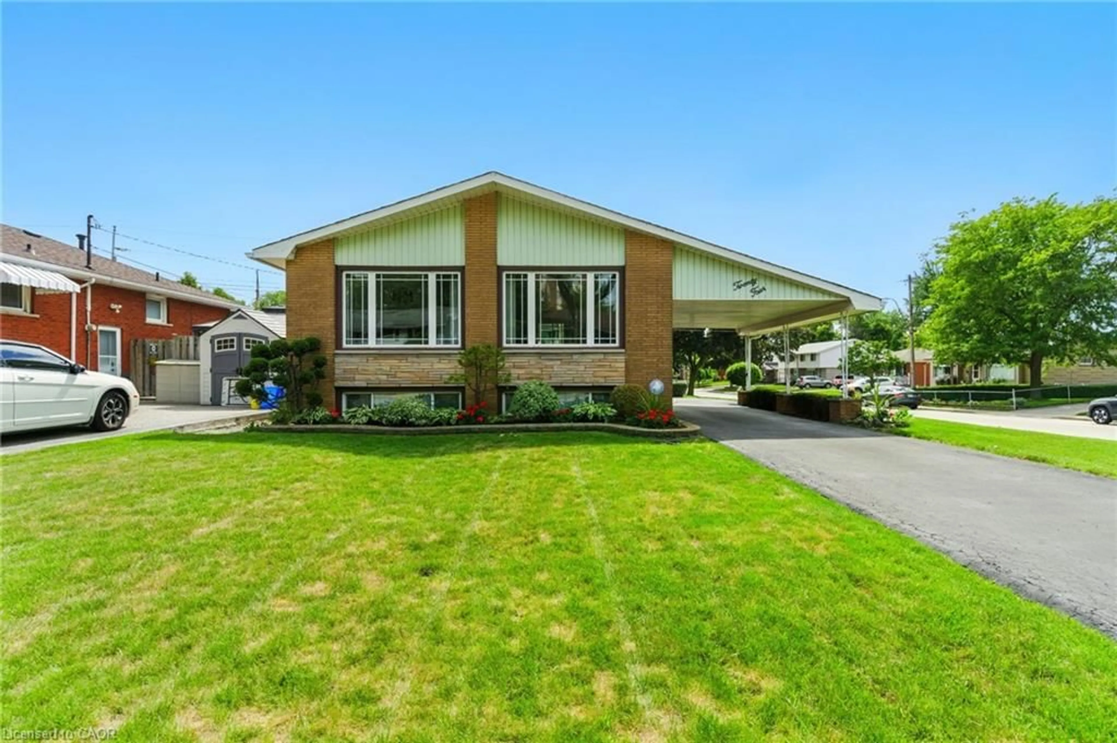 Home with vinyl exterior material, street for 24 Meadowlark Dr, Hamilton Ontario L9A 2K6