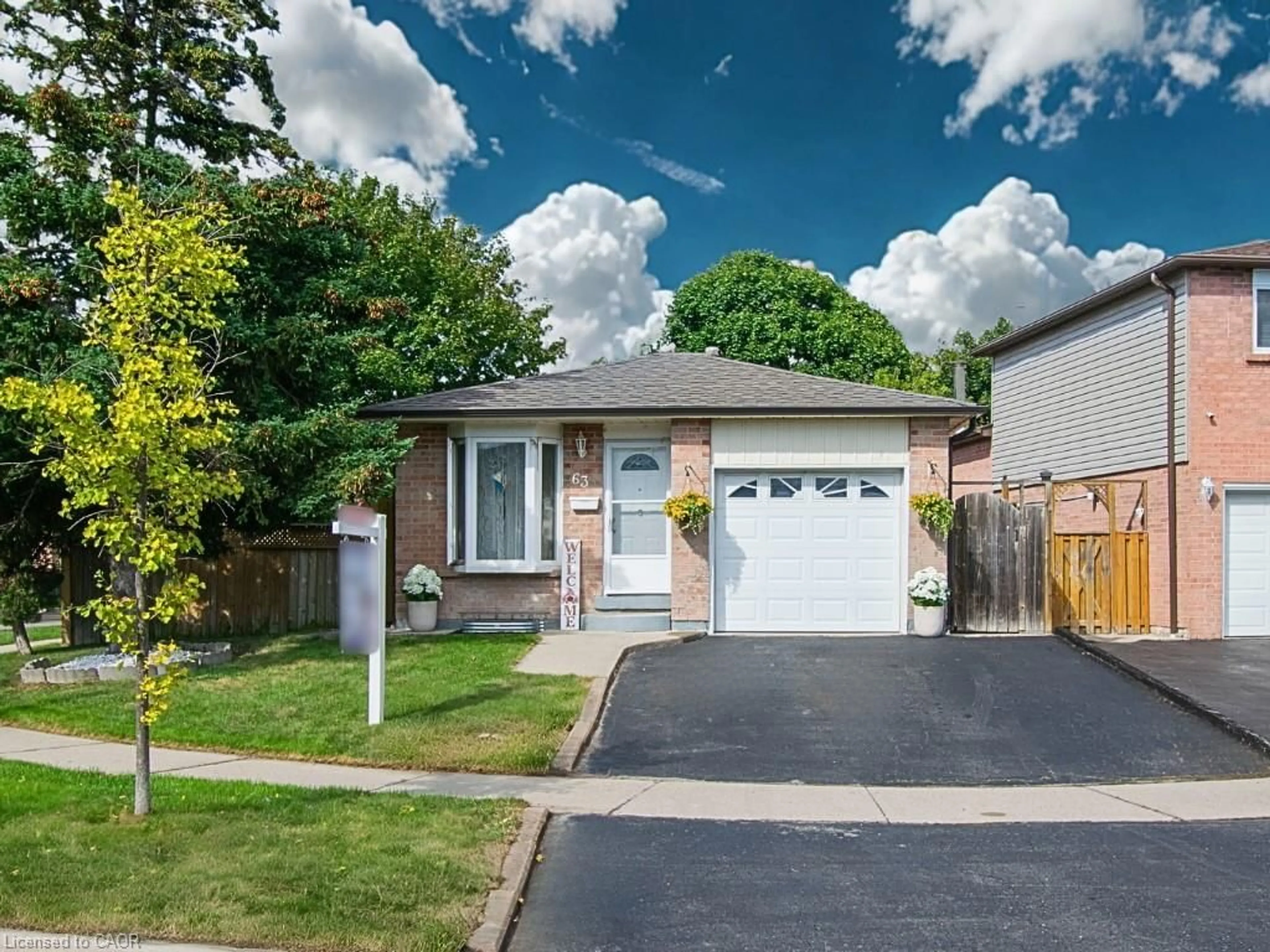 Home with brick exterior material, street for 63 Martindale Cres, Brampton Ontario L6X 2V7